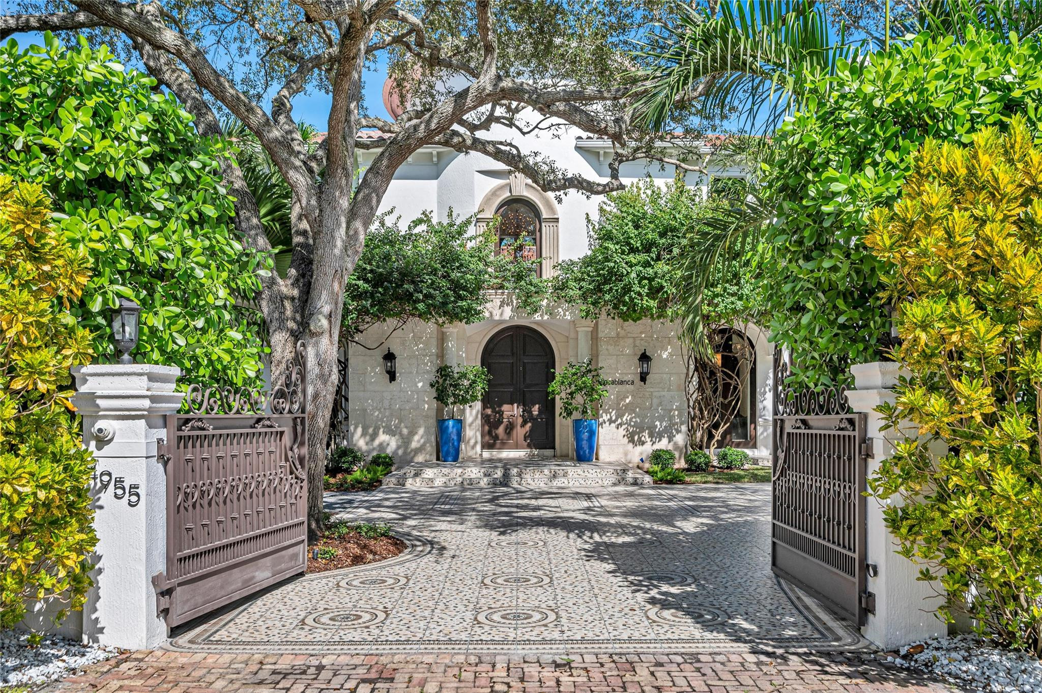 Experience luxury living in this elegantly designed Ponce Davis estate. This 10,230 SF home features 8 bedrooms, 9 full and 2 half bathrooms on 37,026 SF lot. Perfect for entertaining and life, this home offers designer finishes, volume ceilings, a gourmet chef’s kitchen, elevator, media room, and private guest house. Enjoy resort-style amenities including a heated pool, a spa, a tennis wall, a covered summer kitchen and various fruit trees. The primary suite boasts a large separate sitting area and dual walk-in closets and a private balcony with serene views of the courtyard and pool. Located minutes from top-rated schools and Coral Gables's fine dining and premier shopping, this exclusive property combines privacy, sophistication, and delivers the ultimate Miami lifestyle.
