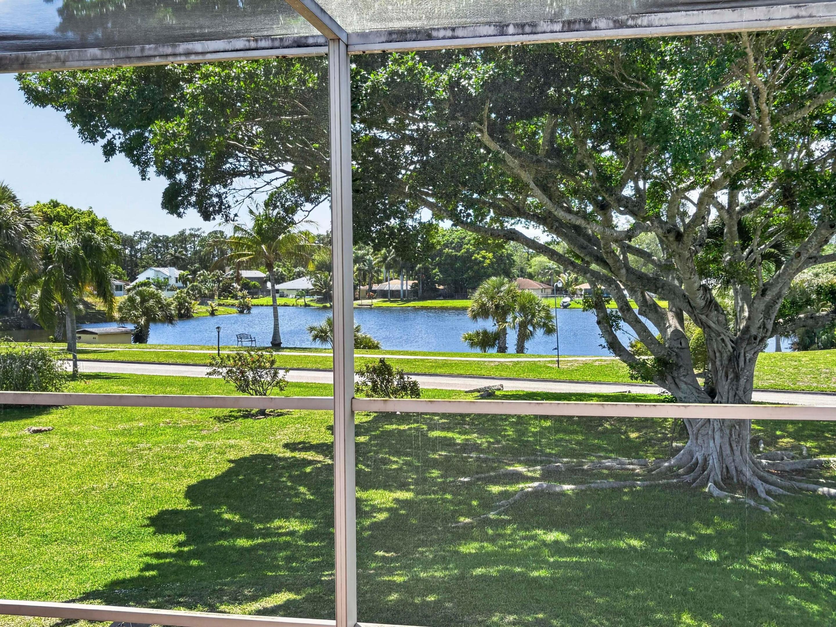Welcome to your tranquil Florida retreat! This light-filled second-floor residence showcases beautiful lake views and a peaceful setting within a desitrable senior community. Offering 2 bedrooms and 2 bathrooms, it's ready for your personal touch. Recent updates include a new A/C in 2025 and a roof replacement in 2024. Additional storage space. Enjoy a spacious balcony with access from both the living area and bedroom, perfect for unwinding while taking in the serene surroundings. Ideally positioned just across from the lake and a short walk to the community pool. Greenway Village is conveniently located within a short drive to a variety of nature, cultural, and entertainment options.
