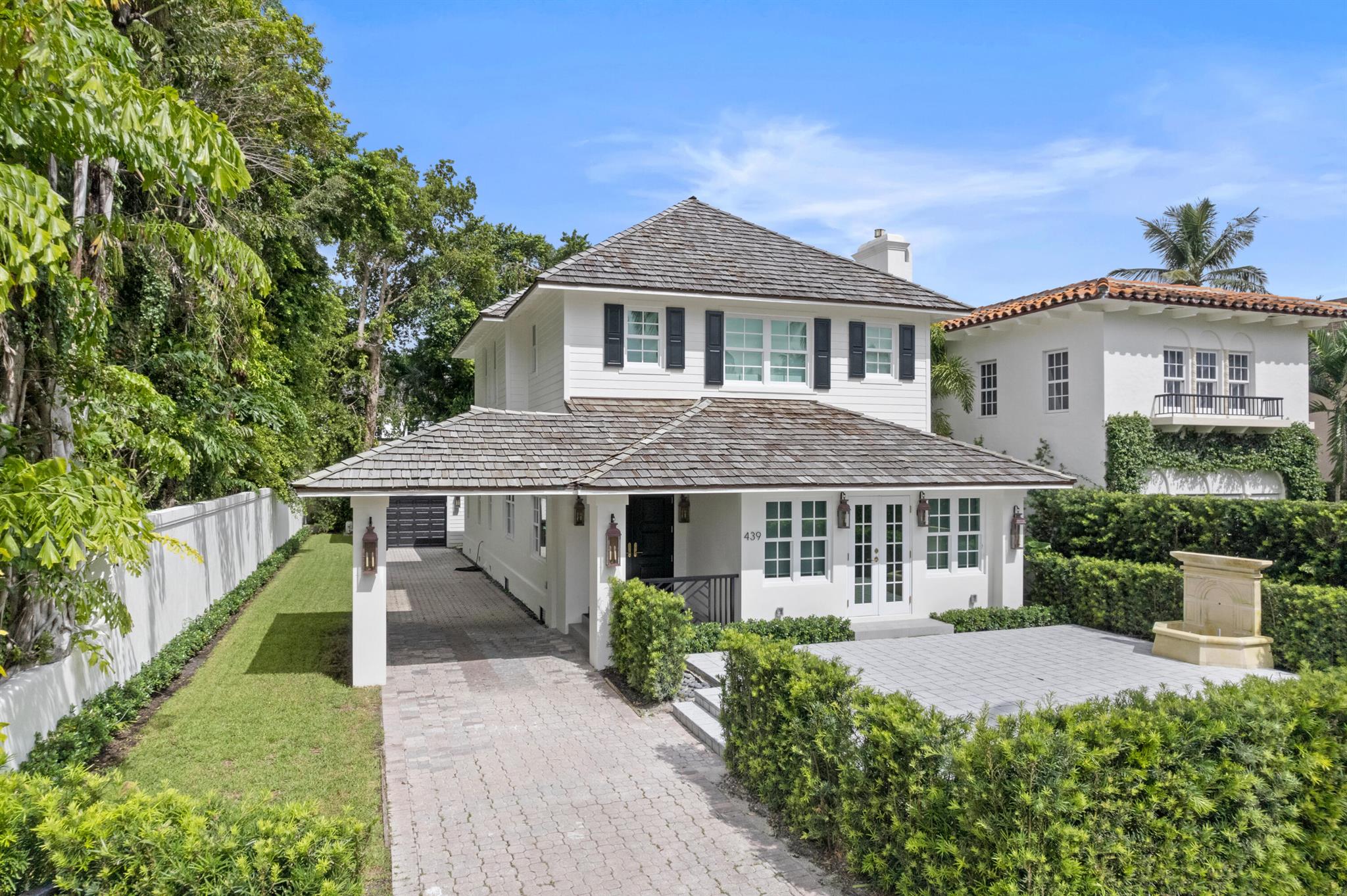Welcome to 439 Seaspray Avenue, a beautifully renovated residence nestled in the heart of Palm Beach. This elegant home boasts a comprehensive two-year renovation, showcasing meticulous craftsmanship and attention to detail. Included are 3 spacious bedrooms each with their own exquisite on-suite bathrooms, each newly designed with modern finishes. The heart of the home, the kitchen, has been completely transformed, featuring top-tier Jenn Aire appliances and sophisticated cabinetry. New white oak hardwood floors flow seamlessly throughout the residence. Every corner of this home has been thoughtfully upgraded with all-new plumbing and electric systems ensuring peace of mind for years to come. New impact windows provide both security and serenity. Don't miss this wonderful opportunity!
