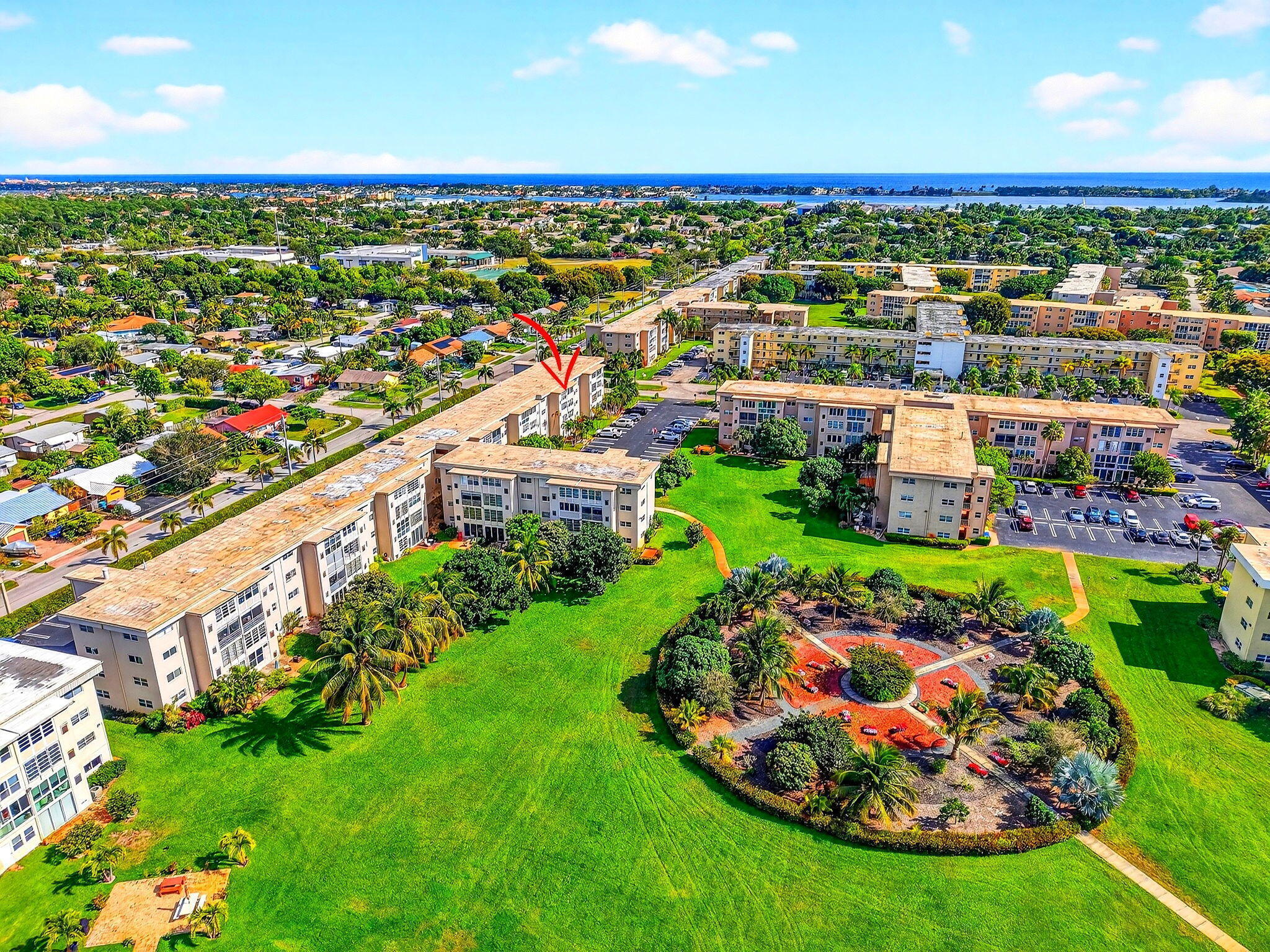 This bright third-floor 2-bedroom, 2-bath condominium is offered furnished or unfurnished and features a comfortable layout with abundant natural light. The enclosed Florida room overlooks peaceful garden views, creating a relaxing space to unwind. Located in the desirable 55+ community of Village Royale on the Green, this residence offers elevator access and a low-maintenance lifestyle. The spacious living and dining area flows into a functional kitchen, while both bedrooms are generously sized, including a primary suite with an en-suite bathroom. A second full bathroom is ideal for guests. Residents enjoy a wide range of amenities, including two pools and spas, a fitness center, clubhouse, card room, bocce ball, shuffleboard, and more.