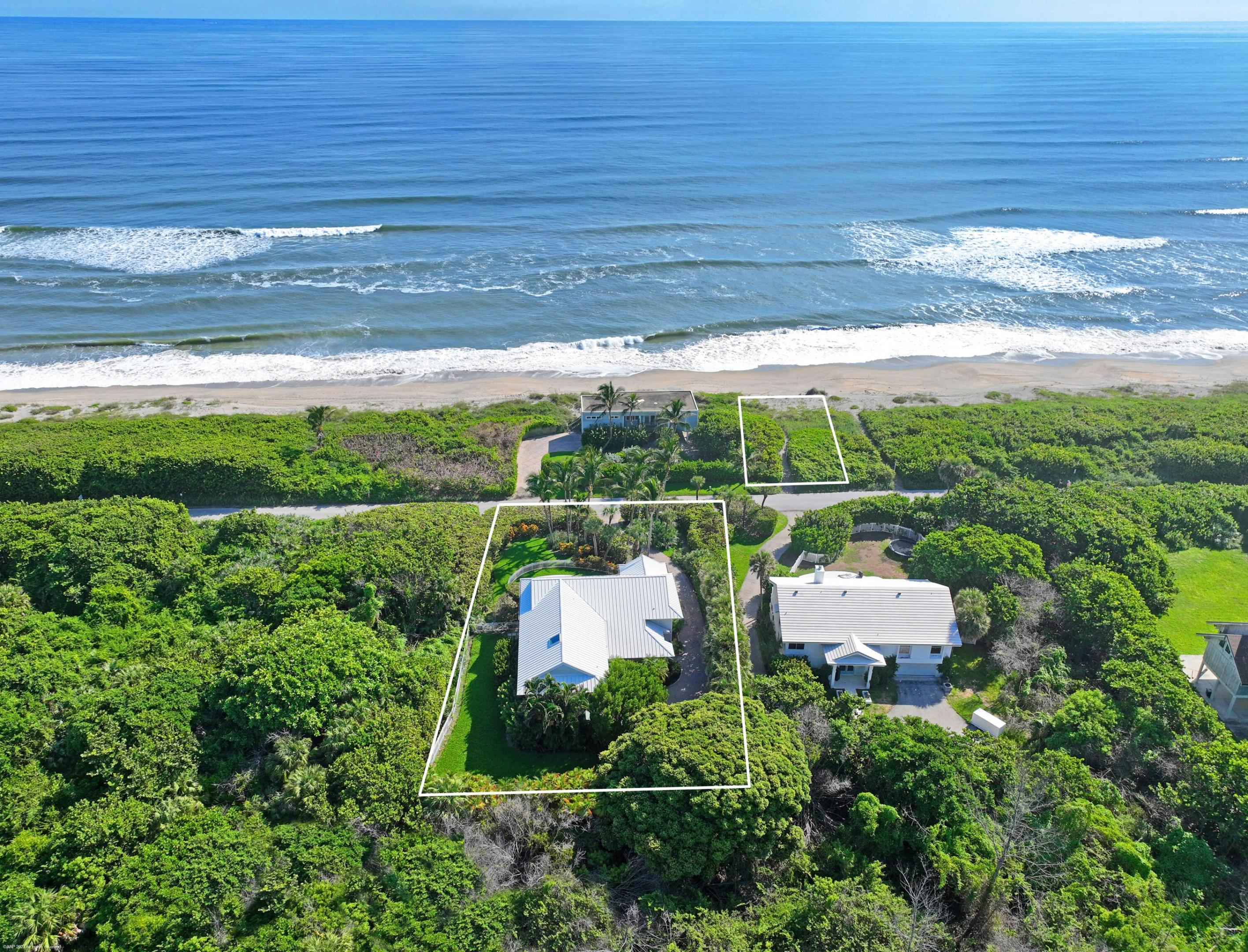 Beach house with sweeping ocean views and a rare 50' deeded ocean front beach parcel. Recently renovated four bedroom, 3.1 bath home with Pool and Elevator. Two story home with First floor featuring  2 bedrooms, bathroom and large family room  guest quarters overlooking the pool.  Second floor with 2 en-suite bedrooms, dining area, kitchen and large family room plus wrap around deck overlooking the ocean. Home features all new impact windows and doors, metal standing seam roof (2017), elevator, newly remodeled kitchen with marble countertops, subzero side-by-side, stainless refrigerator/freezer, large center kitchen island, Thermidor gas stove and convection oven and a separate Bertazzoni electric convection wall oven. HVAC has three zones for everyone's comfort.  2.5 car garage.