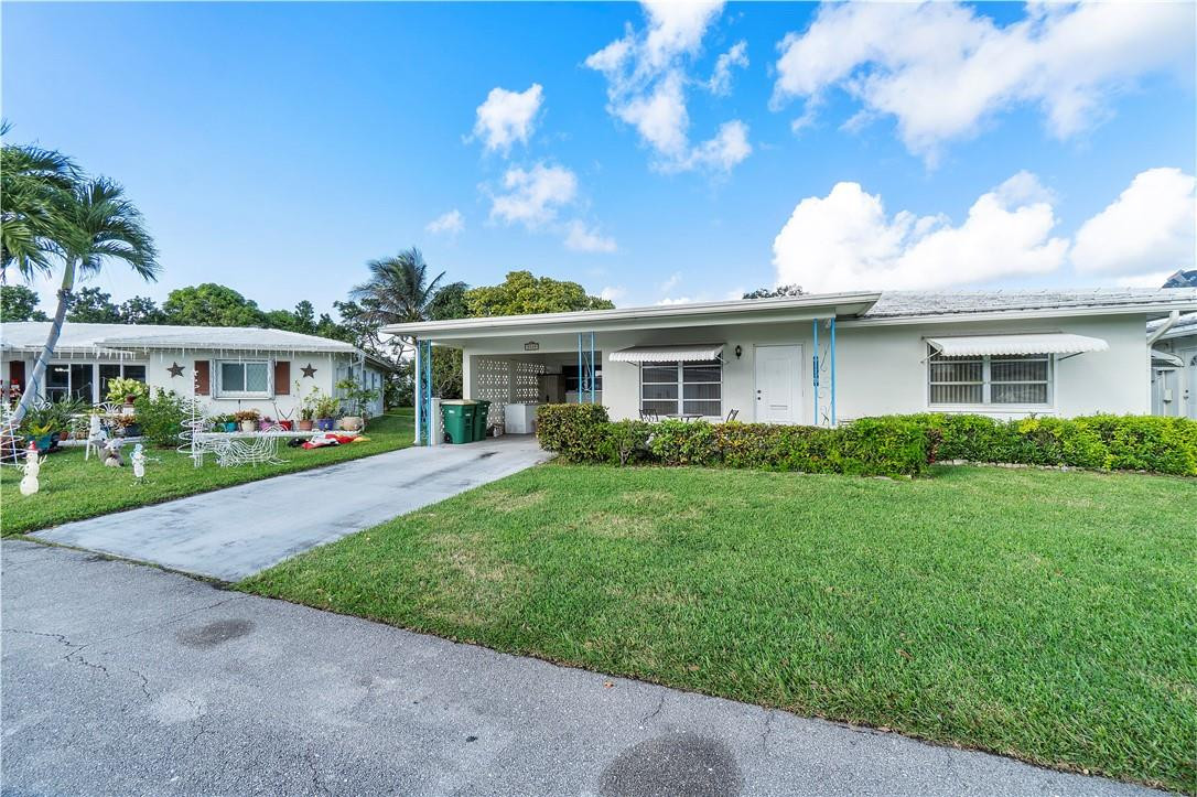 2/1 Single family home in the 55+ community of Mainlands of Tamarac. Home offers 2 bedrooms 1 bathroom, laminate floors in main living area and bedrooms and tile floors in the kitchen and bathroom. Car port with driveway, kitchen with stainless steel appliances, large laundry room with side by side washer and dryer, screen in patio and much more. DON'T MISS THIS GREAT OPPORTUNITY!!!!