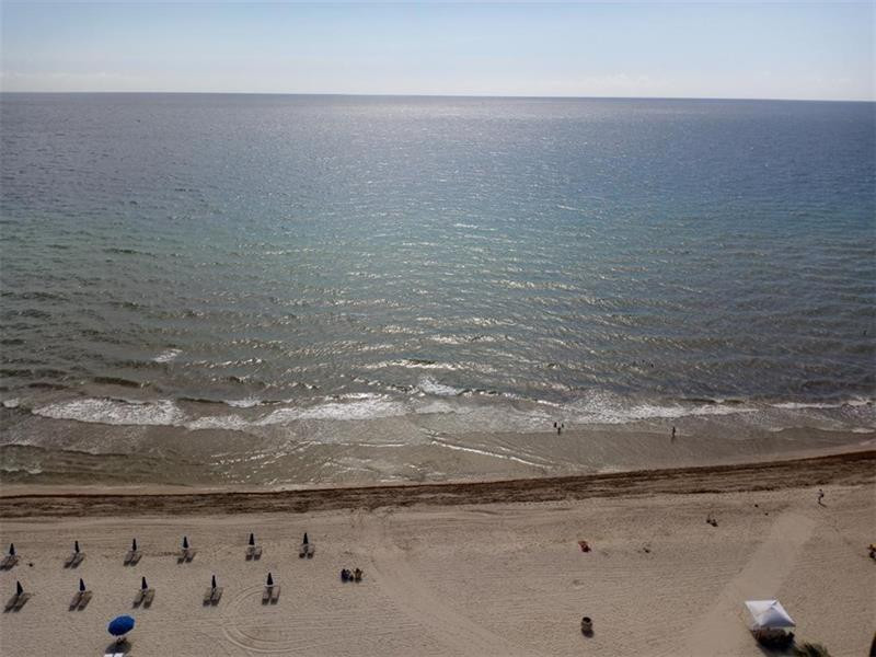 SPECTACULAR DIRECT OCEAN VIEW FROM THIS LARGE SOUTHEAST CORNER UNIT! 2 BEDROOMS PLUS DEN! TILE FLOORS THROUGH-OUT! NEW HURRICANE PROOF WINDOWS AND BALCONY DOORS!! NEW GLASS BALCONY!!GARAGE SPOT INCLUDED! NEWLY RENOVATED OCEANFRONT BUILDING! FULL AMENITIES INCLUDING: BEACH SERVICE, 2 POOLS, GYMS, SAUNA, BILLIARDS, RESTAURANT, 24-HR SECURITY AND VALET PARKING FOR GUESTS. IMMEDIATE RENTALS ARE ALLOWED