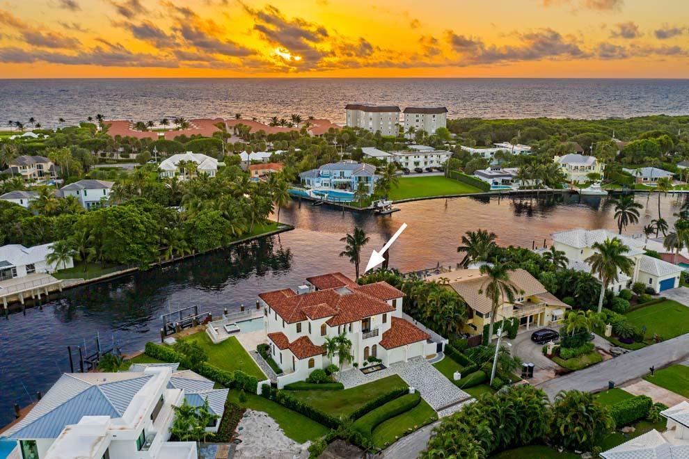 Located on Inlet Cay in Ocean Ridge, this custom built home boasts 137 feet of Intracoastal waterfrontage and stunning views. The four bedroom residence offers over 5,700 total square feet; impressive exterior; sleek interior with clean lines; abundant natural light; impact glass; and limestone and cherry wood floors. Enjoy outdoor living, entertaining and recreation with sensational water views; gentle coastal breezes; heated, salt-water pool and spa; large covered and open terraces; and two docks with lifts. Boaters will appreciate the incredible protected dockage just two minutes from the inlet and open ocean access. The grounds are private with fenced yard and decorative pathways. Conveniently located between Delray Beach and Palm Beach, this Ocean Ridge waterfront property has it all. FEATURES
" Intracoastal location with 137' waterfrontage and 124' depth
" Custom home built by Randall Stofft Architects for current owner
" 4 bedrooms plus office / 4.1 baths
" 4,185 square feet under air / 5,750 total square feet
" Town of Ocean Ridge offers its residents pristine beaches, oceanfront parks, dedicated Town Hall, and private police department
" Private grounds with front hedge, decorative driveway and pathway to entry
" Large custom double door entry to foyer with views of the pool and waterway
" First floor offers volume ceilings, limestone floors, mahogany doors and gracious living areas
" Formal living room with electric fireplace and access to the grand stairway 
" Formal dining room with butler's pantry and easy access to kitchen
" Open kitchen with high-end appliances, large island, breakfast nook, pantry, built-in desk, and French door access to the terrace and pool
" Family room is open to the kitchen with French doors overlooking the pool and waterway
" First floor office overlooking the pool and water
" First floor guest bedroom with cabana bath with access to pathway, pool and grounds
" First floor powder room and large laundry room with side door to south grounds and pathway
" Two-car garage located off service hallway near laundry room and kitchen
" Impressive stairway with limestone steps, custom railing and stunning chandelier
" Master wing with spacious bedroom; exercise room with bonus space; two large walk-in closets; spacious master bath with jetted tub, glass walk-in shower, dual sinks and separate make-up vanity; and large balcony with gorgeous views of the grounds and Intracoastal Waterway
" Northeast en suite guest bedroom with walk-in closet and balcony with waterway views
" Southwest en suite guest bedroom with Juliette balcony
" French doors open to covered and open terraces; multiple balconies overlooking the pool, waterway and grounds
" Expansive terraces for outdoor living, dining and lounging
" Heated salt-water pool with spa
" Two docks with lifts, protected dockage and nearby inlet for open ocean access
" Fenced and gated grounds with pathways and green spaces





" Poured concrete structure throughout first and second floors
" Impact glass windows and doors
" Two car garage and large laundry room
" Conveniently located close to Delray Beach and Palm Beach

This stunning waterfront property offers 137 feet of waterfrontage with gorgeous views and easy access to the ocean. Inlet Cay in Ocean Ridge is the perfect spot to enjoy the South Florida Luxury Lifestyle.