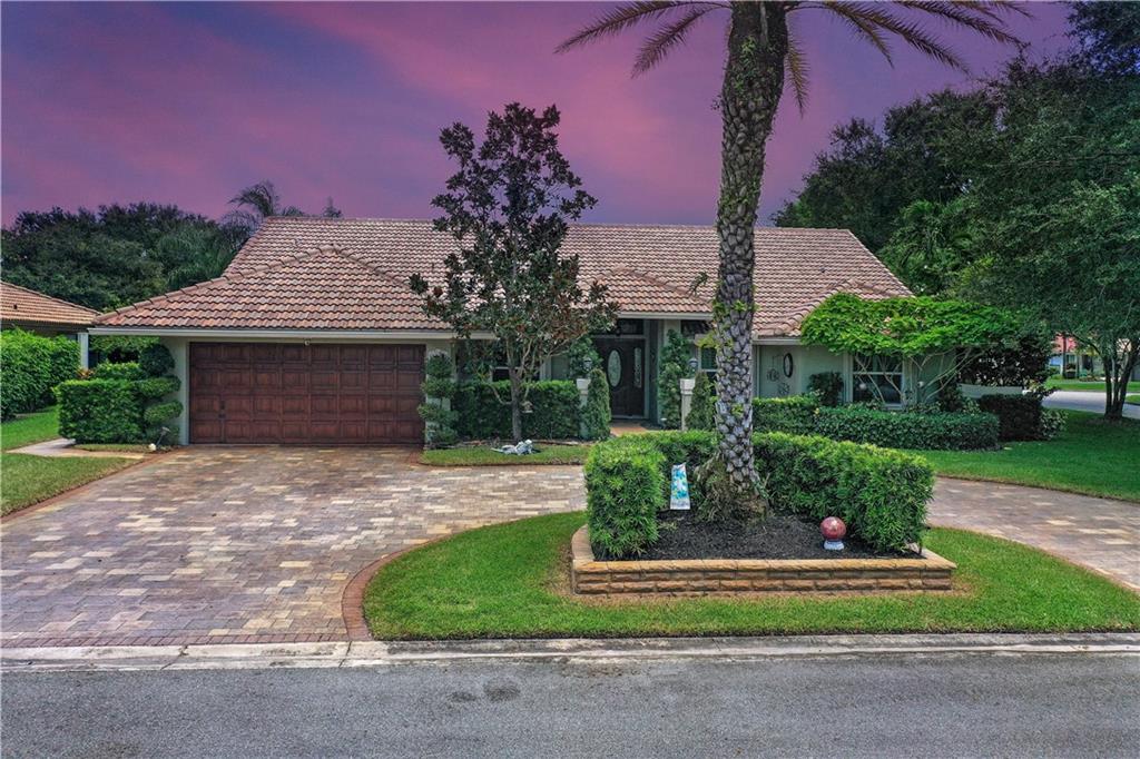 TURN KEY IS A UNDER STATEMENT!!! This one of a kind Pine Ridge home offers FULL Hurricane protection with IMPACT windows and cabana door, Accordian shutters for double protection around every door and window, a Beautifully remodeled Kitchen and Master bathroom done in 2017, along with porcelain tile throughout ,  Brand new LG & Samsung kitchen appliances from 2018, paved circular driveway done in 2014, post Wilma Barrel tile roof completed in 2007, Plantation Shutters on every window done in 2018, BRAND NEW high Capacity pool pump and salt chlorinator installed in august of 2021, built in " BLAZE" grill outside with mini fridge ,Hand made soft close cabinetry throughout the entire home, Larger than normal pool ( Dimensions 15x30) with Multi colored pool light, and all on large corner lot!!