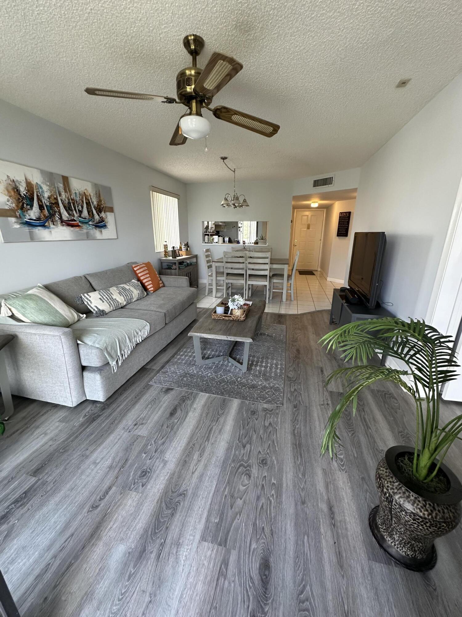 Very unique 2/2 nice apartment, located in desirable Poinciana Comunity with Washer and Dryer inside the unit. AC Unit is 1 Year old.Water and Cable is also included. This beautiful condo has laminate and tile floors. Master bedroom has a walk in closet. Porch facing peaceful lake, water fountain and Gazebo to enjoy daily view. Hurricane shutters in all windows. Two big pools available at walking distance. Huge Club house. Golf courses very close by. Quiet neighborhood, close to turnpike and I-95 for your convenience. First, last and security required. 650 minimum credit. 55+ (al least one person ).  Unit must be owned at least 18 months before it can be leased. Minimum 650 credit score required per applicant.