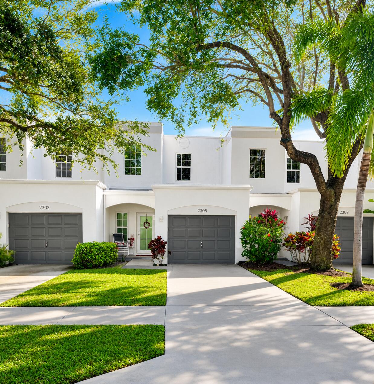 This hidden gem in Coconut Palms, an exclusive enclave of six townhomes within the highly coveted Tropic Isle community. Enjoy an unbeatable location just minutes from the beach, vibrant Atlantic Avenue, premier dining, boutique shopping, and entertainment.  Rarely available and aggressively priced to sell, this move in ready 3-bed, 2.5-bath, 1-car garage w/ community pool offers the perfect blend of style, comfort, and convenience. Discover spacious living area, a bright contemporary kitchen, designer finishes, and elegantly updated bathrooms. Step outside to your own private fenced outdoor space, perfect for relaxing or entertaining. Open House and first showings Friday, June 19 from 10:00 AM-2:00 PM and Saturday, June 20 from 11:00 AM-1:00 PM.    Don't miss this rare opportunity!