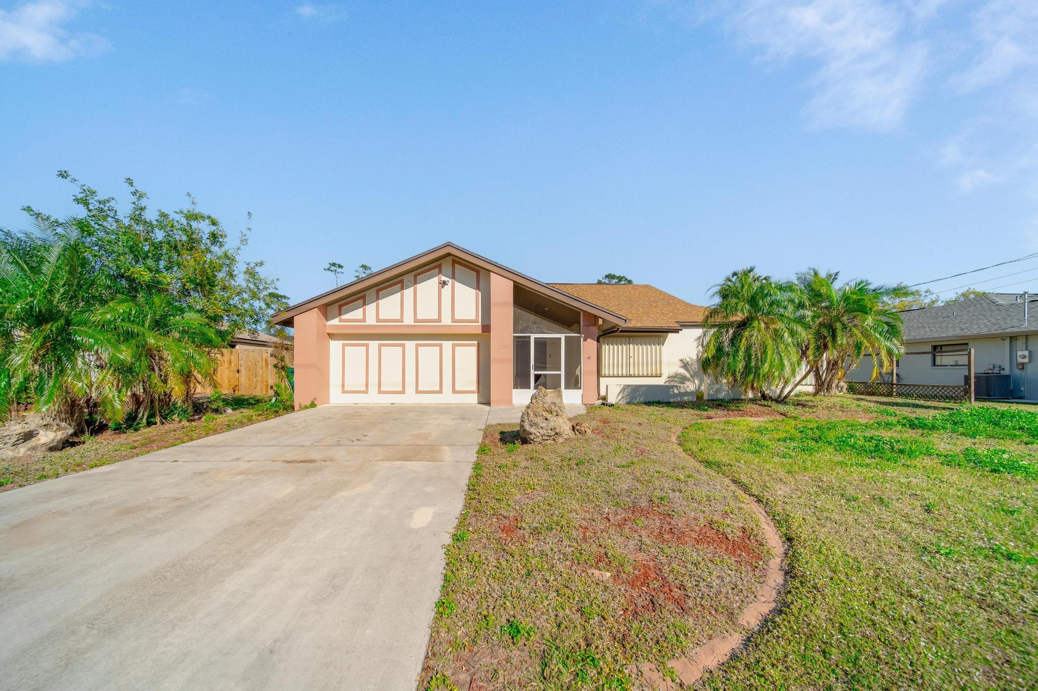 Don't miss this 3-bedroom, 2-bath home on a spacious lot with tranquil canal views. Featuring soaring vaulted ceilings and an open floor plan, the home offers both a separate living and family room—ideal for relaxing or entertaining. Enjoy a covered, screened-in patio perfect for year-round outdoor living, along with a versatile Florida room. The large laundry room adds convenience, and the garage has been converted into additional living space—ideal for a home office, gym, or guest area. New roof in 2022. Located just 4 miles from Charlotte Harbor and near Maple Leaf and Kings Gate golf, with boating, fishing, biking, and more nearby. Can be sold furnished.