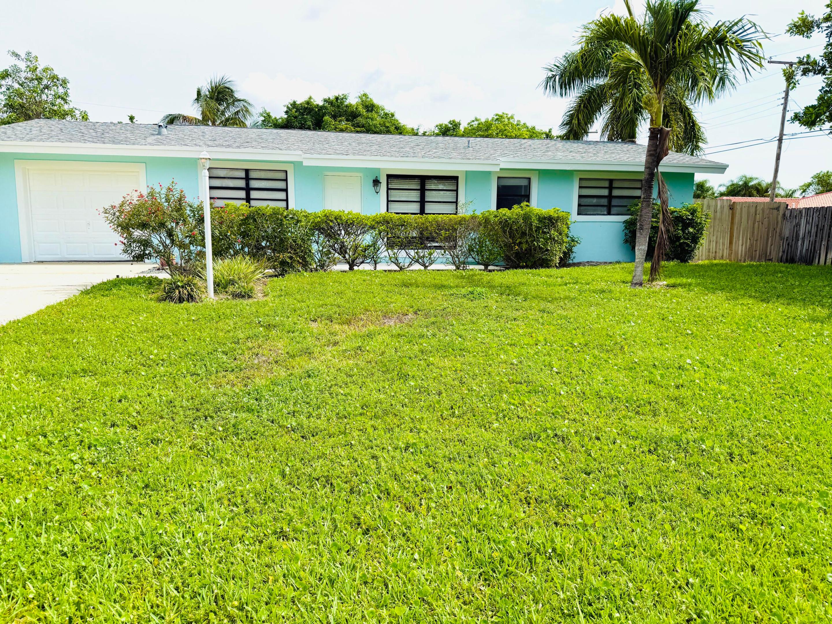 East Boca Raton Gem! No HOA & Minutes to the Beach! This 3 Bedroom 2 Bath home features beautifully upgraded bathrooms and a stylish kitchen with granite counters, stainless steel appliances, pendant lighting, and large neutral diamond set tile flooring throughout. Spacious bedrooms, and a primary ensuite with walk-in shower and walk-in closet. Guest bath includes a shower/tub combo. Enjoy a fenced backyard with a patio, which is perfect for entertaining. Pet-friendly and attached garage completes this home. Live the Florida lifestyle with no HOA and easy access to shopping, dining, and just minutes to the beach!