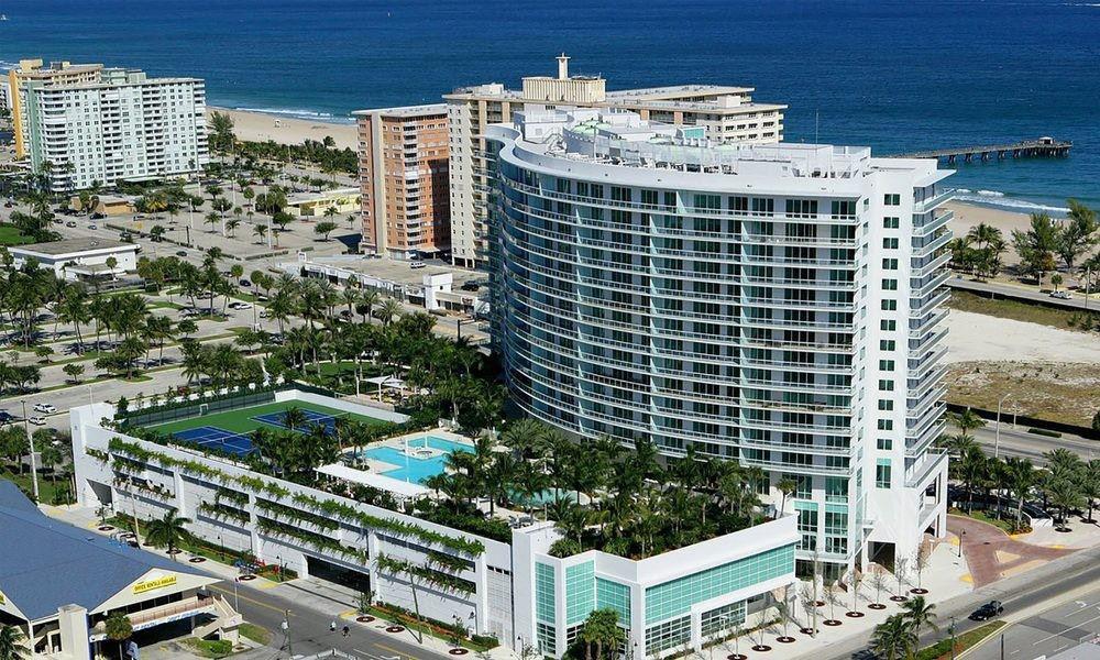 ***FIVE STARS*** Amazing building located across the street from the ocean, 24 hours security, 2 beds, 2 bath, condo 713 is possessing Intracoastal, Pool and City Views. Outdoor amenities include: Resort Pool, Grill Area, Fireplace Court, Tennis Courts (2). Indoor Amenities include: News Cafe, Fitness Center, SPA, Sports Lounge, Virtual  Reality Goff Simulator, Theater, Media Center, Club Room and Bar, Wine Room, Cigar Humidor. 2 side by side parking garage on second floor no.: 47 and 48. 1 Storage space no.: 47. SOLD AS-IS. FURNISHED, the 2 yellow recliners chairs are excluded from the sale.