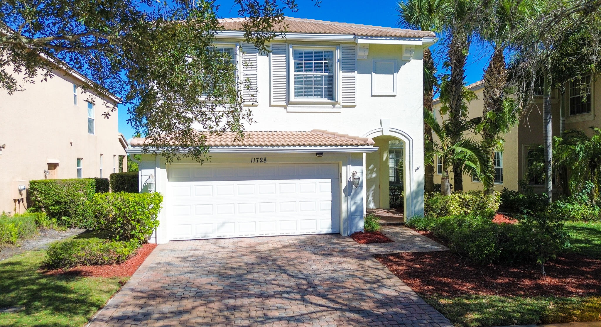 PRICED TO SELL in TownPark at Tradition! This spacious and beautifully maintained 5BR/2.5BA pool home offers room to spread out and enjoy Florida living at its finest. Featuring a brand-new 2024 roof and 2025 water heater, this move-in ready two-story home showcases tile flooring downstairs, laminate upstairs, and multiple living areas ideal for entertaining or everyday comfort. The upgraded kitchen includes granite countertops, stainless steel appliances, 42'' cabinets, pantry, center island, breakfast bar, and cozy breakfast nook. The oversized primary suite features dual vanities, soaking tub, separate shower, and ample closet space. Step outside to your private backyard oasis with covered lanai, open patio, sparkling pool, and accordion shutters for added peace of mind. A must-see home