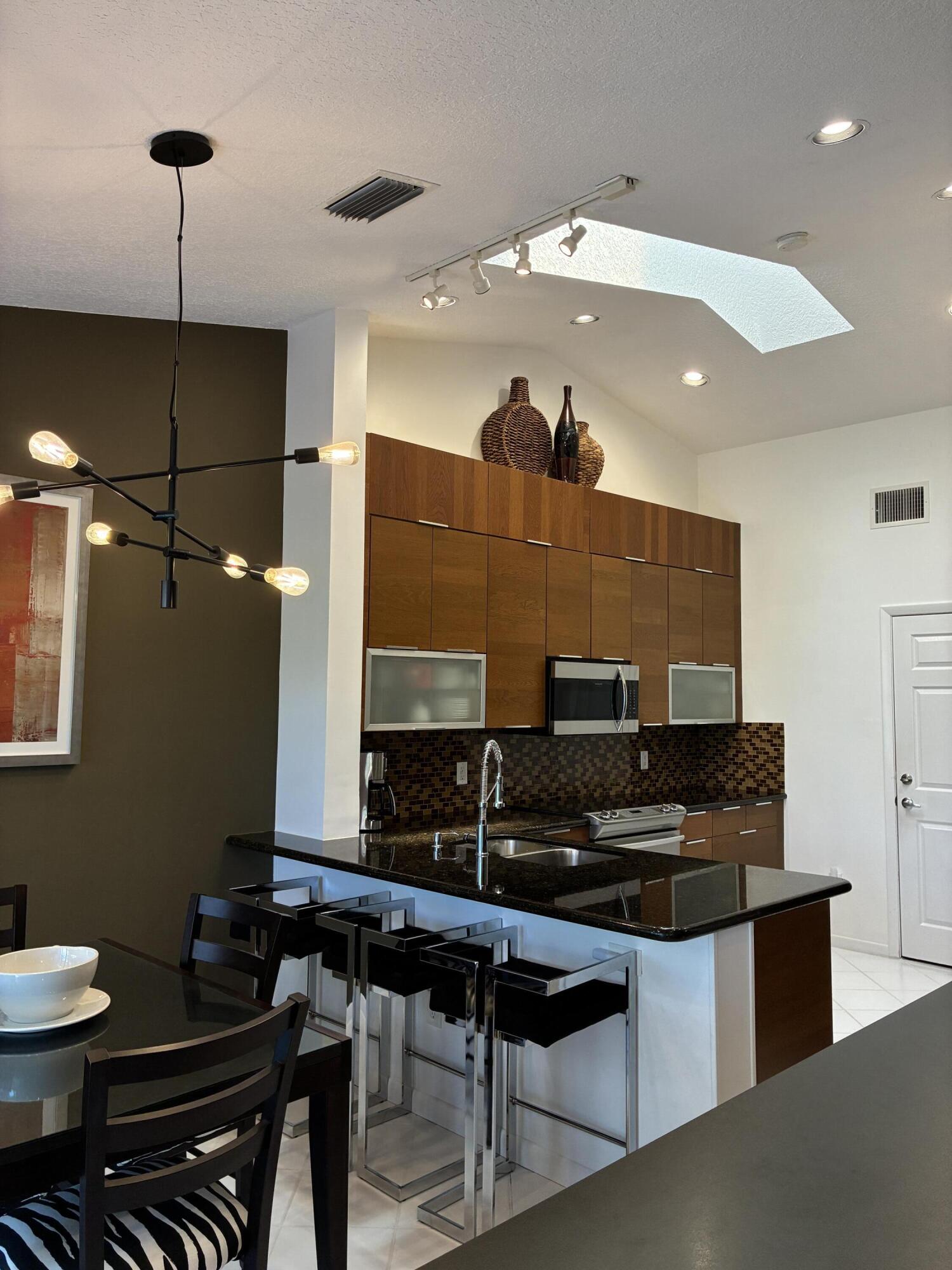 ST TROPEZ AT BOCA GOLF VILLAS CONDO - Residential