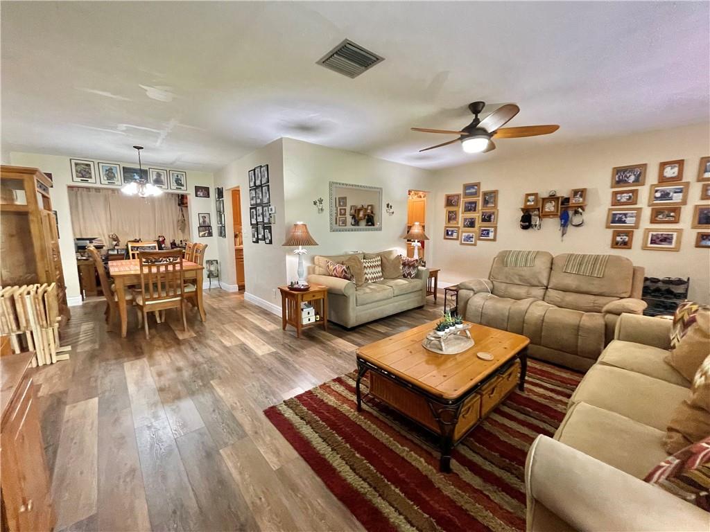 MOVE-IN READY! Remarkable Home in Northwest Tamarac. | FHA/VA/Conv | Near Shopping and Highways. Updates Include: Impact Windows | Brand New Floors | S/S Appliances | Washer and Dryer | Water Heater | Air Ducts | Hedgeable 2,000 SQ Ft of Backyard | Low HOA | Broward County School Choice Available | 13 Ceiling Fans Throughout | 2 bedrooms 2 bathrooms W/ Extra Room for Office / Baby Room or Guest Room 10 x 10 | 1 Car Garage with up to 4 Car Driveway | Enclosed Backyard Patio & Enclosed Front Home Patio Area | Copper Wiring. Enjoy Parties at the Westwood 3 Pool Area and Clubhouse Within 1 Street From Your Home. Come and Become a Neighbor in a Phenomenal Community. You Will Enjoy the Tranquility and Warmth This Home Provides.