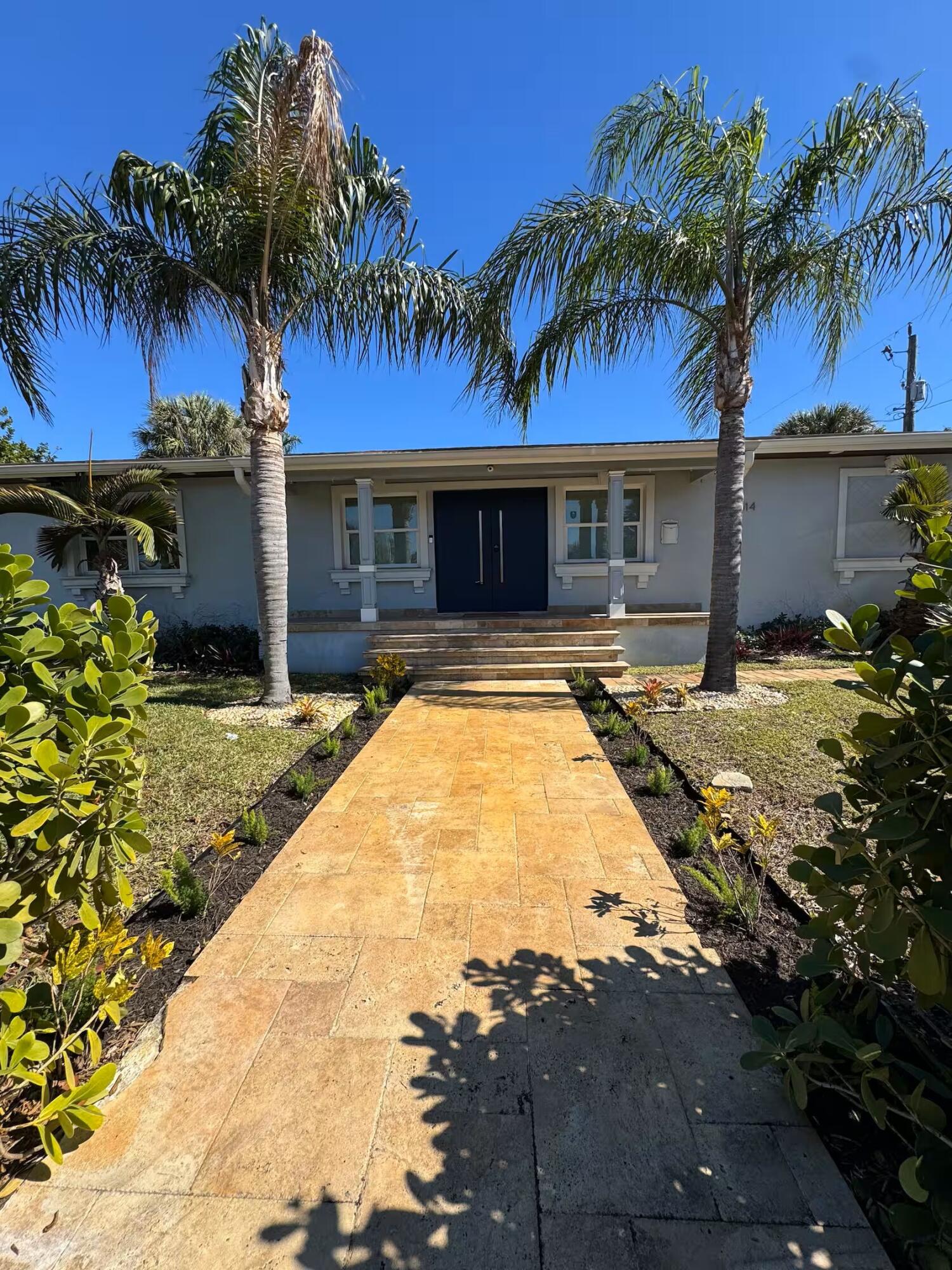 Beautifully renovated CBS home in the desirable Northwood Shores neighborhood, just minutes from the Intracoastal Waterway, Palm Beach Island, downtown West Palm Beach, beaches, shopping, and dining. This move-in-ready 3-bedroom, 3-bath home features an open floor plan filled with natural light, a designer kitchen with a quartzite waterfall island, granite countertops, white shaker soft-close cabinetry, stainless steel appliances, and quality finishes throughout. The split-bedroom layout offers privacy, while the fully fenced corner lot provides ample space for outdoor entertaining or a future pool. A turnkey home in one of West Palm Beach's most sought-after neighborhoods.