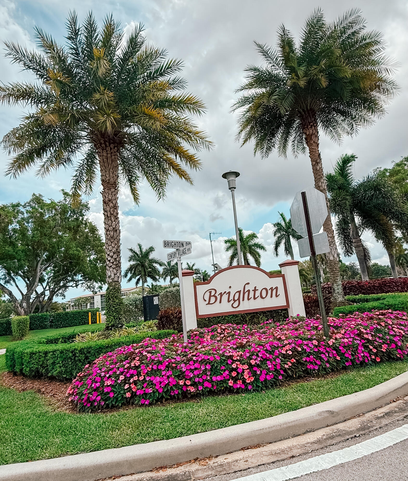 Welcome to 66 Brighton B in the heart of Century Village Boca Raton, where easy living meets everyday convenience in a warm, welcoming community. This desirable corner unit invites in extra natural light, giving the space a bright and airy feel that's hard to find.  Enjoy peace of mind with full hurricane shutters already in place, and the added convenience of an elevator building—no stairs, no stress. Just outside your door, you're only a short, easy walk to both the laundry and your additional storage, making day-to-day living simple and efficient.  Whether you're relaxing at home or taking advantage of the vibrant community amenities, this unit offers a comfortable and low-maintenance lifestyle in one of Boca Raton's most well-known active adult communities.