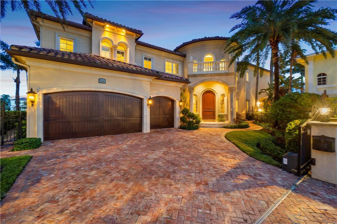 Summit built gated custom estate with stunning views of the Hillsboro Lighthouse and Lake Placid from this home with 203’ of the best waterfront. Bright open floor plan with spectacular sights from every window. Elevator ready. Stone floors throughout the living areas with 5 bedrooms and 5 1/2 baths. There is a gourmet kitchen with double Wolf ovens, Wolf gas range, walk in pantry and prep island. Beautiful master suite with ideal balcony to take in the views, luxurious bathroom with large Jacuzzi tub, 2 huge walk-in closets. Other features include large second floor loft/library, fireplace, laundries on both floors, outdoor kitchen with fireplace, separate from house, an office or guest suite/bath and closet. All of this - on one of the best lots in the area on a quiet cul-de-sac street!