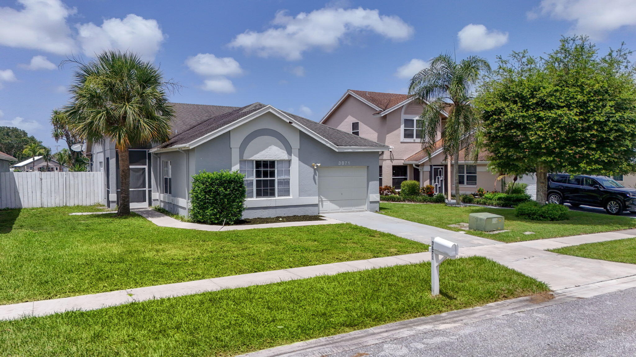 OPEN SUNDAY 7.19.26 from 11 am to 1 pm. What a value! Solid CBS construction, 3 bedrooms, 2 baths plus 1 car garage directly on a wide lake view! Owner is planning to pay for and install a brand new roof prior to closing! 33 x 12 covered, screened patio to enjoy the peace and serenity of the lake! Huge primary bedroom with lake views from 2 windows and French door access to patio. Split bedroom floorplan gives separation from generous guest bedrooms. Soaring volume ceiling in the great room with triple sliding glass door providing lake view and patio access.