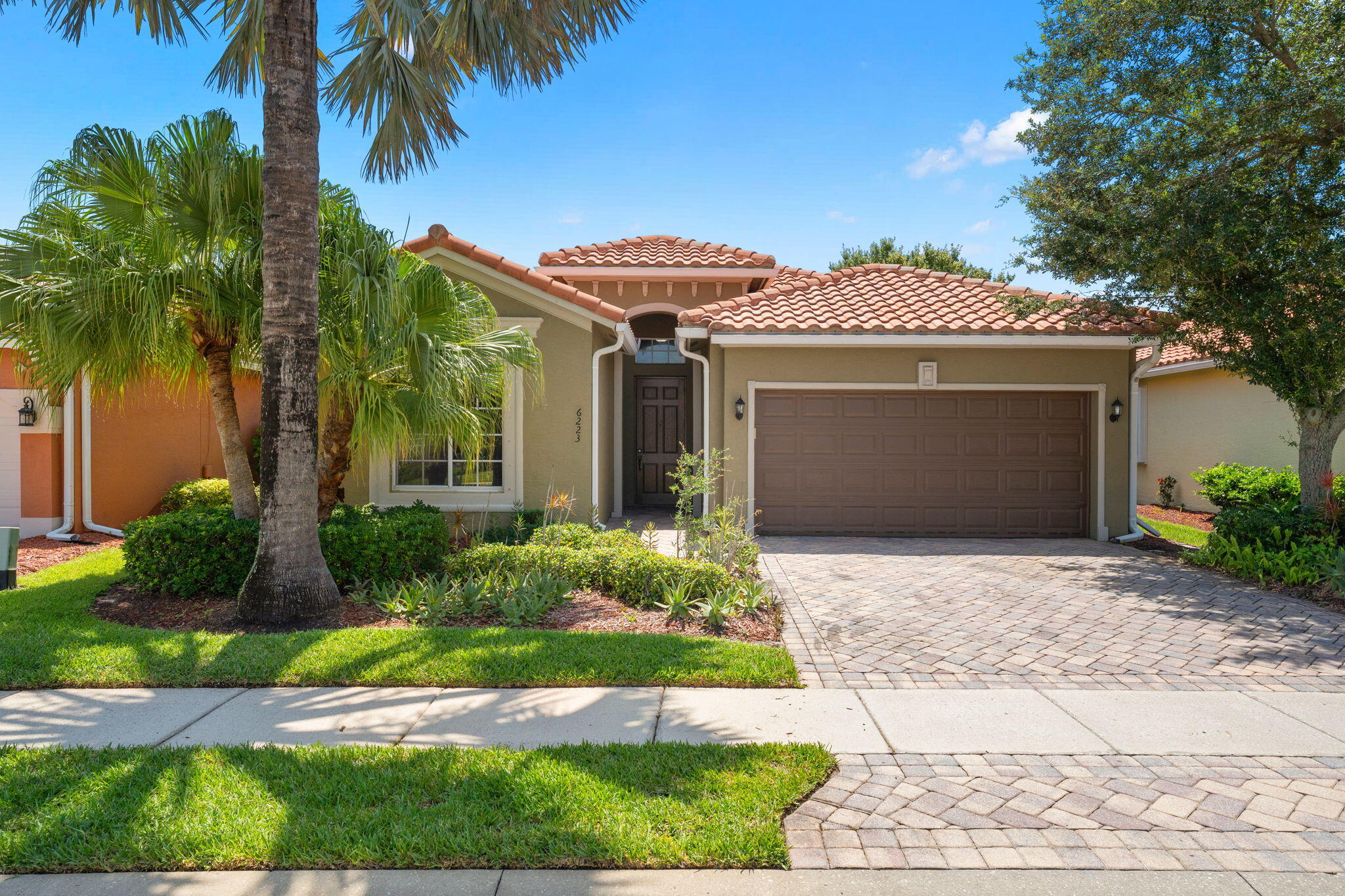 Located in the highly sought-after Woodfield 55+ community in Vero Beach, this 3-bedroom, 2-bath home offers 1,897 sq ft of comfortable living with a functional, open layout. Interior features include a blend of carpet, laminate, and tile flooring, along with a well-appointed kitchen with stainless steel appliances. The spacious primary suite features dual vanities, a soaking tub, and separate shower. Enjoy an active, resort-style lifestyle with access to a clubhouse, pool, spa, tennis courts, fitness center, and game room, all within a secure gated community. Perfect for enjoying the best of Florida living.