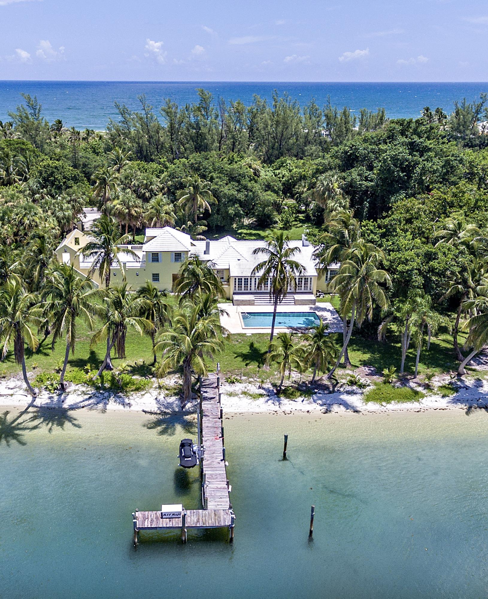 Charming Bermuda Style abode on southern end of Jupiter Island is one of the last of its kind- Truly encapsulating the Jupiter Boater's Paradise only minutes to full service marinas & Jupiter & Stuart Inlets. Sitting on one acre of land with 200 feet of direct no wake zone, intracoastal frontage- one can truly submerge in the radiant sun & aqua blue waters on their own sanded beach/L shaped dock or just through the deeded beach access directly across the street. Most convenient, is its short ride to Jupiter/Stuart restaurants & shops. This property is ideal for a renovation project or new custom design/build project.