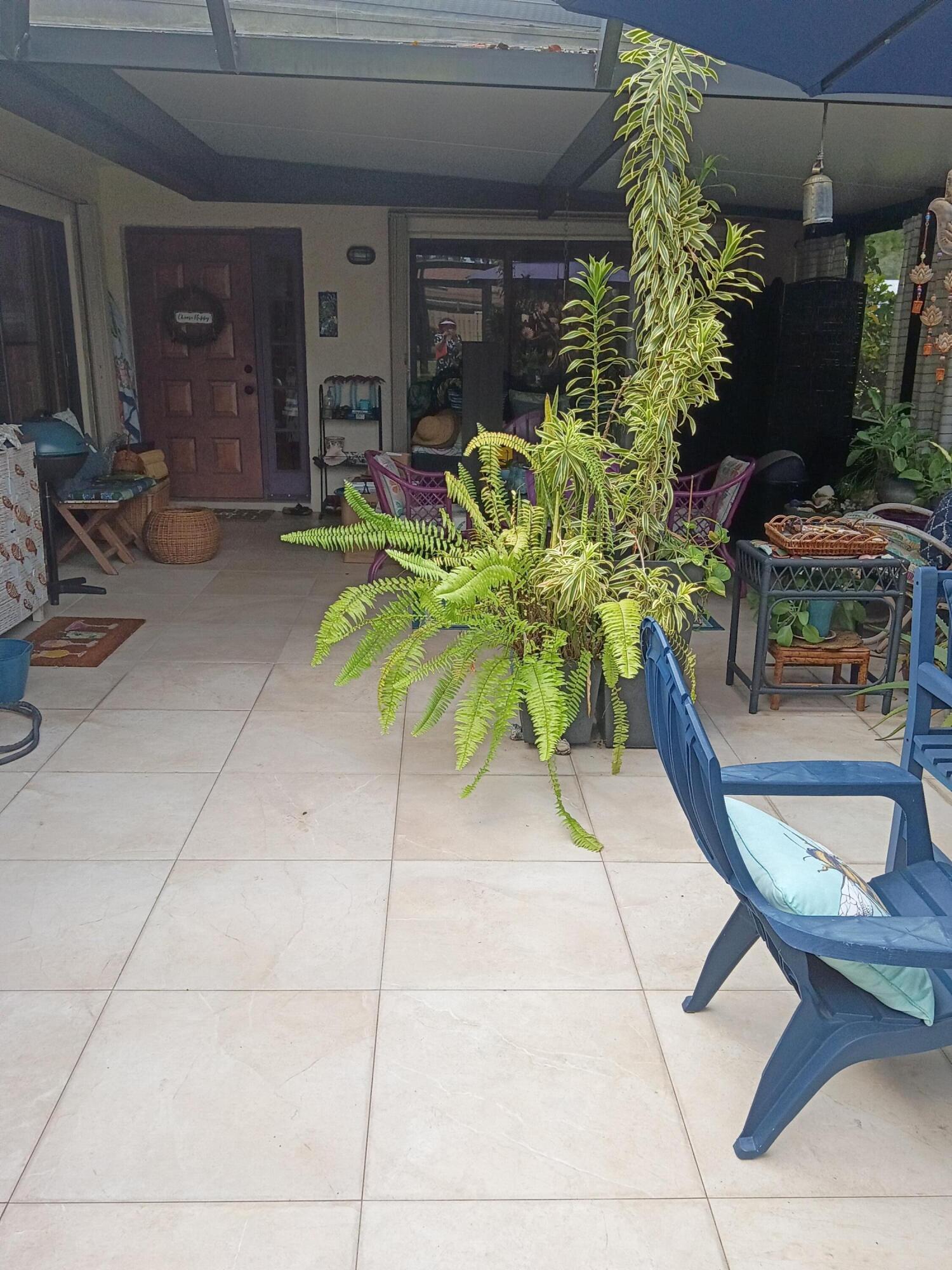 SPACIOUS 2 BEDROOM, 2 FULL BATH, ACTIVE  GATED ADULT COMMUNITY. ENTER INTO GORGEOUS PRIVATE OPEN AND SCREENED PATIO TO ENJOY ENTERTAINING AND RELAXING. UNIT INCLUDES LOTS OF UNIQUE FEATURES, KITCHEN, LIVING/DINING AREA WITH BUILT IN BAR. BOTH BATHROOMS REMODELED, PRIMARY BEDROOM WITH WALK IN CLOSET. ALL ROOMS LOOK ONTO PATIO AREA WITH SLIDER WINDOWS. ACCORDION SHUTTERS FOR  STORM PROTECTION. GREAT LOCATION, QUICK WALK TO 1 OF 5 POOLS, CLUBHOUSE AND PICKLEBALL COURTS. RAINBERRY BAY OFFERS TENNIS, PICKLEBALL, CLUBHOUSE WITH GYM, WEIGHT ROOM, CARD ROOMS, ARTS AND CRAFTS, EXERCISE CLASSES. THEATER WITH ENTERTAINMENT, LAKE WITH WALKING PATH, PET FRIENDLY, HOA INCLUDES ROOF REPLACEMENT, CABLE WITH HBO AND WIFI.