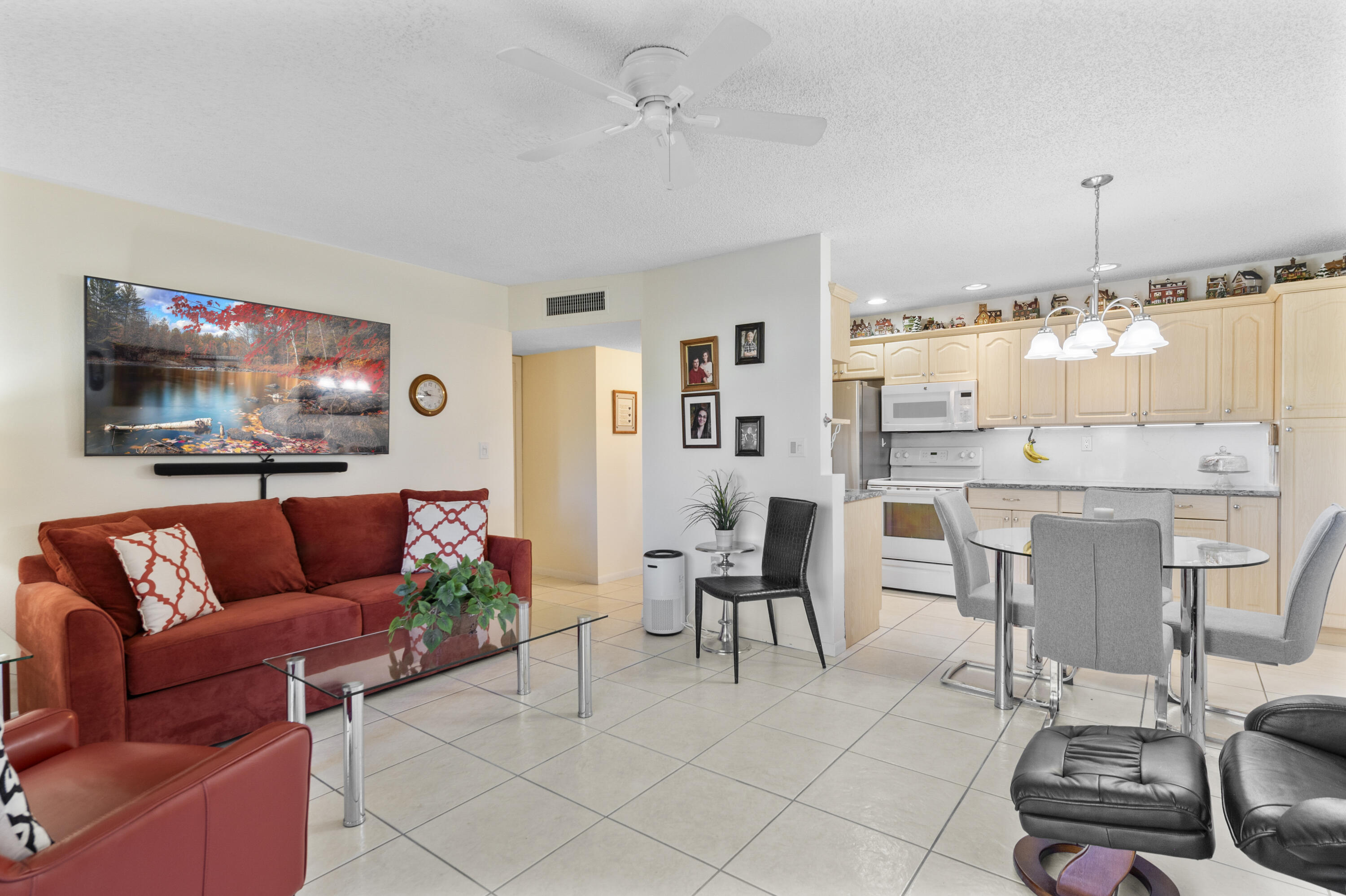 Bright & Airy well-kept 1/1 condo located at Sabal Palm Village in Tamarac, 55+ Community. This immaculate cozy unit is located on the 2nd floor, Large open concept kitchen wooden cabinets w/ additional cabinetry, newer quartz counter tops, under cabinet lighting, SS fridge & white appliances. Tile flooring throughout, A/C 2017, W/Heater 2018, Newer impact hurricane windows. Large M/bedroom w/ custom wall closet (great for extra storing) & walk-in. Enclosed patio features impact windows, electric blinds with remote - Can be used as a Den/Office. Laundry room on premises located on same floor, unit comes w/ extra storage. The association offers a clubhouse with library, fitness room, heated pool, BBQ area & tennis courts etc. Secured Lobby. Mins to Turnpike, Shopping Plazas and Restaurants.