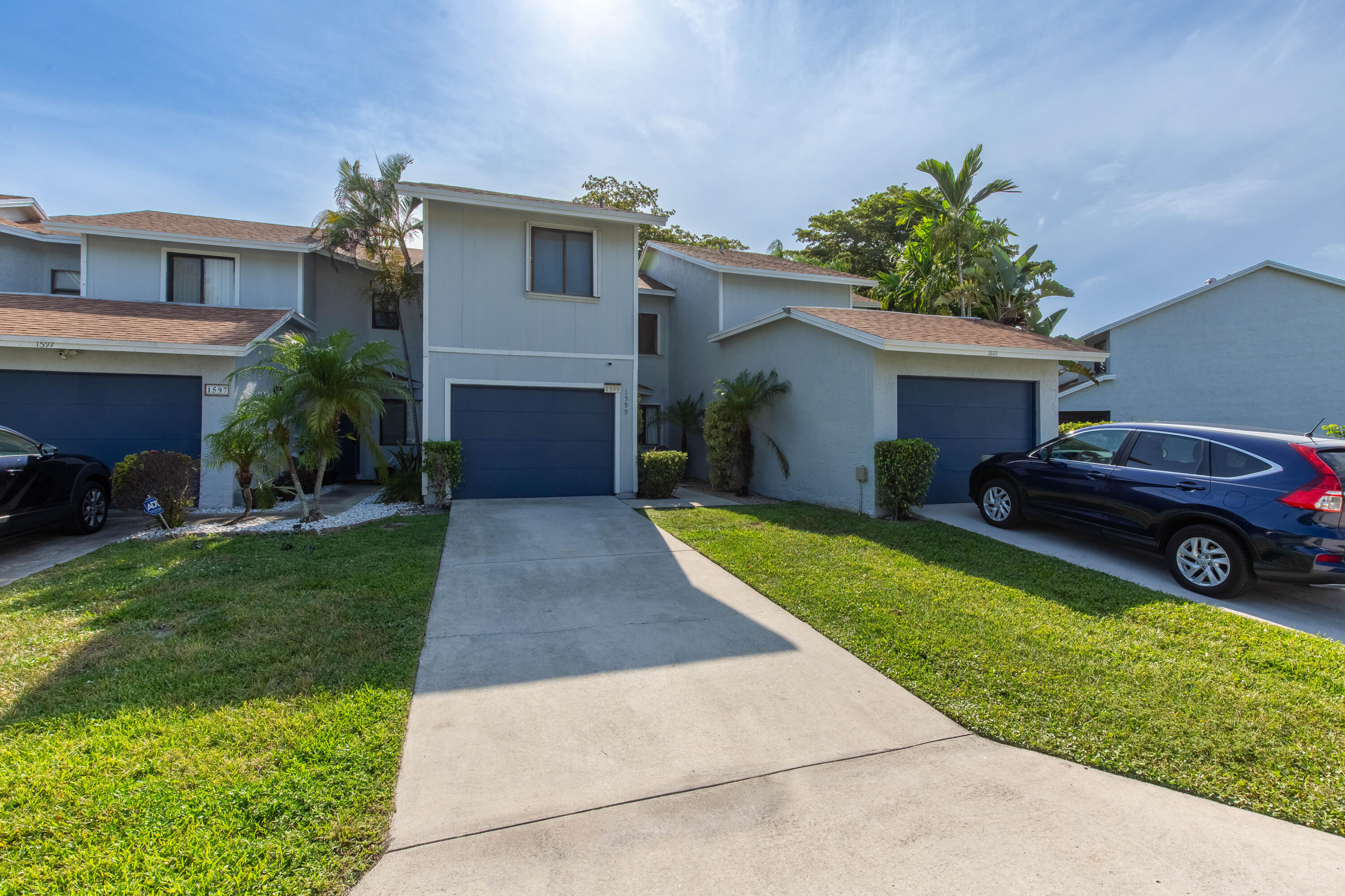 Quietly positioned on a lake in central Palm Beach County, 2 bedrooms, 2.5 bathrooms, dedicated den that can serve as 3rd bedroom and one-car garage offers something increasingly rare: a genuinely central address. You're equidistant from the beaches and the western communities, minutes from I-95, and close to Palm Beach International — the kind of location that keeps every commute short and every option open. Step inside; 1,519 square feet under air lives larger than the number suggests. The home is full of warmth and easy charm, with living areas that open toward serene lake views.  The flexible den works as a home office, a third sleeping space, or a sitting room, giving the floor plan real versatility. Two well-proportioned bedrooms each have their own full bath.  Convenient powder room for guests, and the attached one-car garage adds everyday ease. The HOA includes: insurance, lawn care, and community amenities are covered, leaving you a low-maintenance lifestyle. A newer 2022 roof brings added peace of mind and long-term value.  Call the listing agent to schedule your showing.