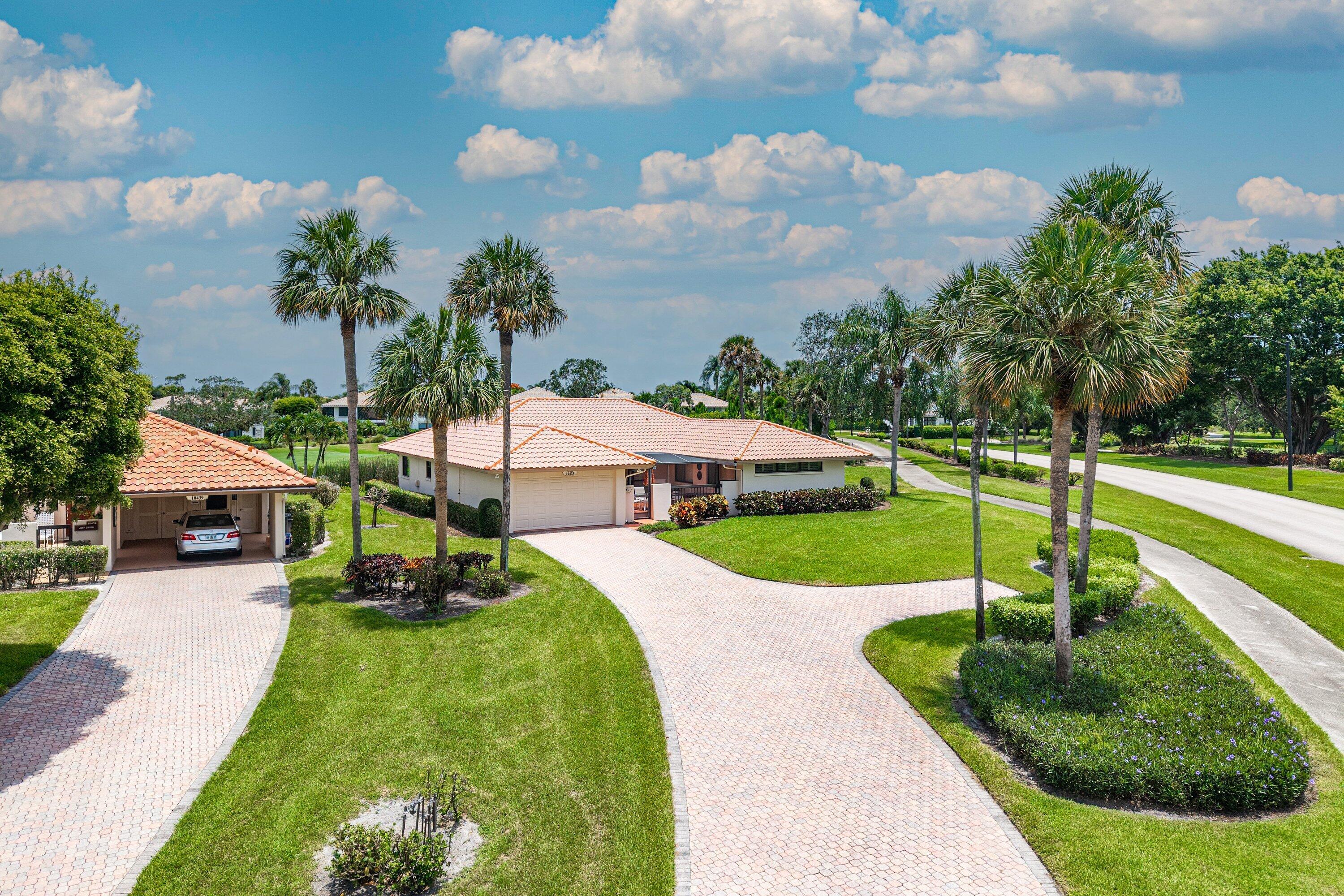 This lovely villa overlooks the lake & green on #12 of the newly redesigned North Course.  Featuing an oversized paver driveway with an extra parking pad, this well maintained villa has a spacious screened front patio, level lanai, white kitchen cabinetry w/ granite counters, stainless appliances, garage w/ impact door & a newer electrical panel.  Neutral tile is in the living area, bedrooms are carpeted & Plantation shutters are throughout.  The Coralberry section provides convenience to the north gate of the community.  The Club at Quail Ridge is one of the finest clubs in the area, boasting 2 championship golf courses, a new racquet facility with both tennis & pickleball and both fine & casual dining in the spectacular new clubhouse.
