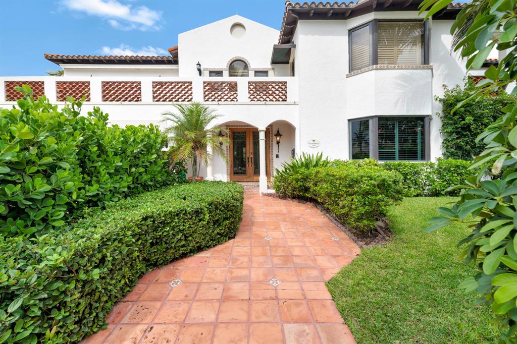 Steps from the Atlantic Ocean, this casual 4 Bedroom Mediterranean is in an A-1 convenient Palm Beach location! Light filled, it has soaring ceilings and well-scaled gorgeous entertaining spaces. The living room expands via a wall of glass to the generous pool and patio that are extremely private and serene. A generous eat-in kitchen is adjacent to a family room next to the pool. A rare opportunity for easy indoor-outdoor living. Easy access to deeded space on the beach. This property features a two car garage, study, and many other great features!