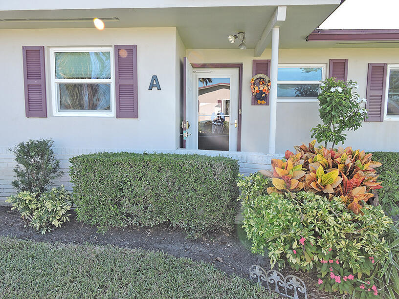 Welcome to this charming two-bedroom, two-bathroom villa in Cresthaven Villas 12 Condo, located in West Palm Beach, Florida. This single-story residence offers 892 square feet of finished living space, providing comfortable accommodations in a well-established villa community. Has impact windows throughout the home along with an impact sliding door which leads to nicely tiled screened patio. Sit outside while you enjoy the early morning sunrise or late evening sunset on the outside pavers. The kitchen was remodeled with cabinets that reach the ceiling for extra storage space along with a wall that was removed which opens up into the dining area. The home was nicely painted throughout with tastefully chosen colors that make the home nice and bright.