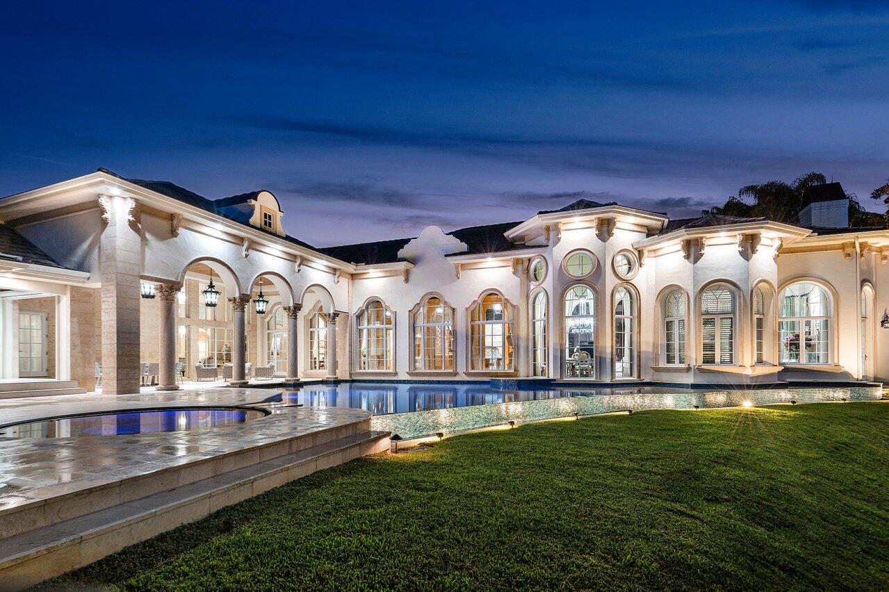 Simply one of the most exquisite homes in prestigious St. Andrews Country Club. This renovated estate is located on a spectacular property of .83 acres (essentially comparable to a triple lot in the community). This extraordinary property includes a winding driveway around a central fountain; a tree canopy of beautiful, mature live oaks; and expansive east facing water views. Combining European elegance with modern technology and convenience, this residence provides approximately 9000 square feet under air and has five bedrooms (all ensuite), six full and two half baths. This comfortable layout is entirely on one level, excluding two of the large guests suites which comprise the second floor. The home features a magnificent office, a six (6) car air-conditioned garage, temperature-controlled wine cellar, gorgeous bar and multiple entertainment venues. The expansive and private outdoor spaces bring together everything needed for the ultimate south Florida living. This includes a new oversized, custom, Infinity-edge pool and spa; a covered loggia for dining and relaxing; an adjacent outdoor, covered living area clad with porcelain tile, a vapor fireplace, beverage center, sink, ice maker and 85" TV. Truly, no expense was spared. The breathtaking exterior curb appeal of this spectacular home, including the iron estate gates and private interior garden courtyard leading to the front entrance, is matched only by the sophisticated and incomparable interior finishes and meticulous attention to detail within. Architectural intricacies, custom design finishes, and the finest materials define this home. Top-of-the-line appliances including Wolf, Sub-Zero, and Miele, dual generators (providing whole home coverage), complete impact glass, LED lighting, multiple fireplaces, linear diffusers, extensive landscaping and custom outdoor lighting are all of the highest quality as would be expected in such a remarkable residence. The estate can be purchased substantially furnished. There is no other home of its kind in St Andrew's Country Club. (See documents for more detail on the special interior elements and unique features of this beautiful home.)

St Andrews is a 24hr manned and gated mandatory membership country club community featuring 36 holes of championship golf, a full service 11,000 sq ft spa, multiple dining venues, a 20,000 sq ft tennis and fitness facility, 19 tennis courts and six pickleball courts, an aquatic center with three pools, playground & rec rooms and is recognized as an Elite Distinguished Club of the World, a Platinum Club of America, one of the Top Ten Healthiest Clubs in America, and received the 2019 North America Best Day Spa by World Spa Awards.


DISCLAIMER: Written & verbal information provided including but not limited to prices, measurements, square footage's, lot sizes, calculations & statistics have been obtained & conveyed from third-parties such as the applicable MLS, public records & other sources. All information including that produced by the Seller or Listing Broker/agent are subject to errors, omissions or changes without notice & should be independently verified by any prospect for the purchase of a Property. The Seller & Listing Broker/agent expressly disclaim any warranty or representation regarding all information. Prospective purchasers' use of this or any written & verbal information is acknowledgement of this disclaimer & that Prospects shall perform their own due diligence.