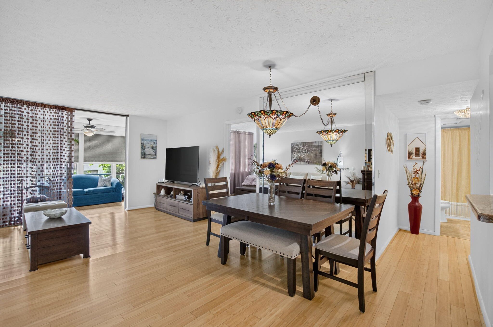 Welcome to this beautifully updated, immaculately maintained two-bedroom, two-bathroom condominium in the desirable Villages of Oriole Abbey community in Delray Beach. Spotless and move-in ready, this second-floor residence offers 1,005 square feet of thoughtfully designed living space with a desirable split-bedroom floor plan, providing both privacy and functionality.  The home features beautiful bamboo flooring, lots of storage space, walk in closet, a stunning kitchen with granite countertops, a tray ceiling, and ample cabinetry, creating an inviting space for cooking and entertaining. The convenience of an in-unit laundry room adds to the home's everyday appeal.   Recent updates include a 2020 air conditioning system and a 2019 hot water heater, offering added peace of mind for the new owner.  Whether you're searching for a year-round residence, a seasonal retreat, or an investment opportunity, this pristine condominium offers exceptional value in one of Delray Beach's most established and convenient communities, close to shopping, dining, restaurants, entertainment, and everything South Florida has to offer.