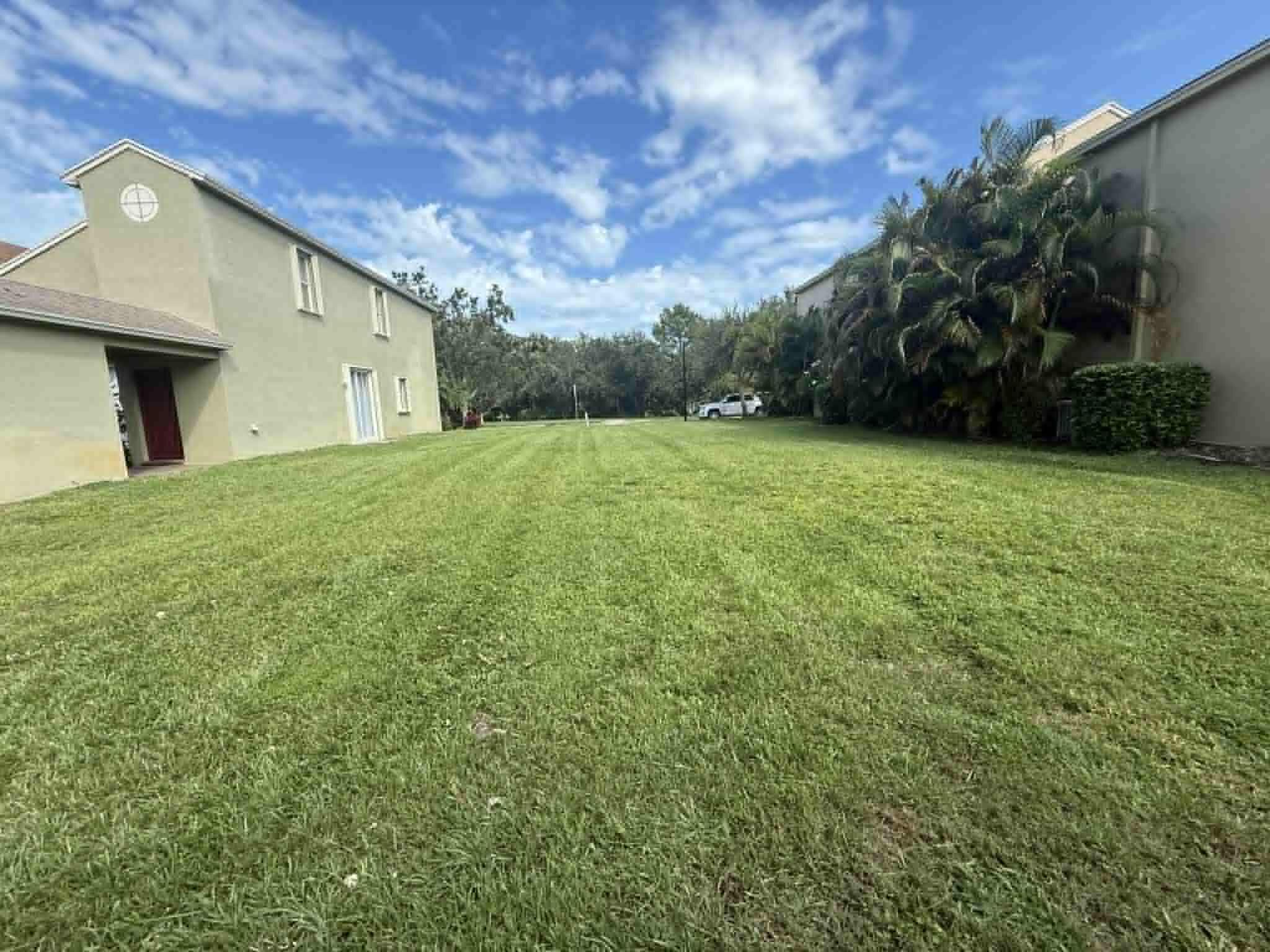 Hidden Gem of a Community-East Lake Village. Vacant lot, flat, clear and ready to break ground in Phase Two just across from a very large water view. Has an extra easement for larger green space than other vacant lots. Amazing setting of pure nature surrounded by trees, water, sidewalks and nature. Close to the ocean for all you ocean lovers. Close to 4 schools for easy access. Now is your time to prepare for new construction at a great value in a great community. When built, HOA Fees include, Internet, Cable, Home Phone, Grounds maintenance and large luscious pool.  Sidewalks and streetlights as well. Drive by to come see this lovely quaint tucked in community, just behind U.S 1 and Port Saint Lucie Blvd area