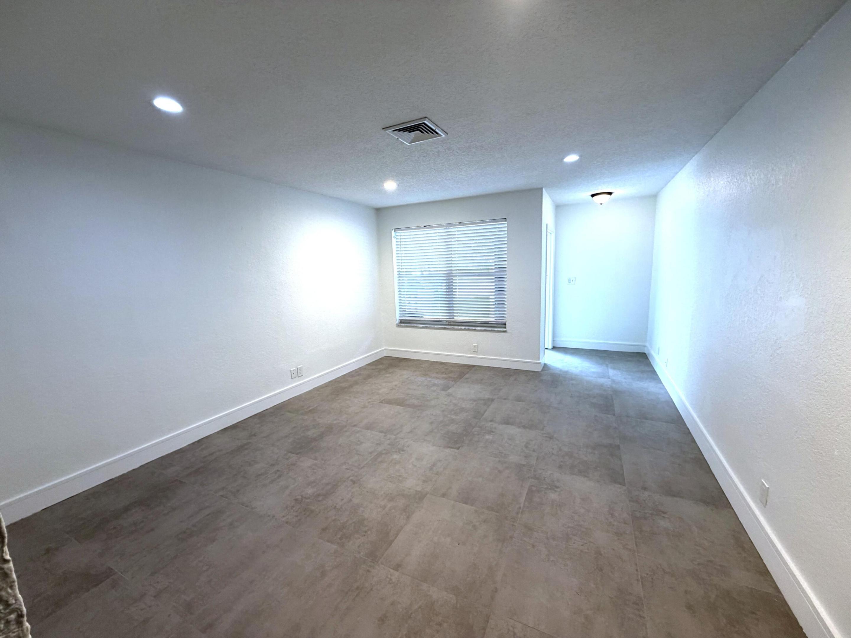 Welcome to this well-proportioned 1/2 duplex residence in THE DELLS, Coral Springs, offering 1,216 square feet of comfortable living space. This two-bedroom, two-bathroom home provides efficient design and practical layout for everyday living. The single-floor plan eliminates stairs and simplifies maintenance, making this an attractive option for those seeking straightforward, accessible home ownership. Located in the established community of THE DELLS, this property offers a solid foundation for your next chapter.