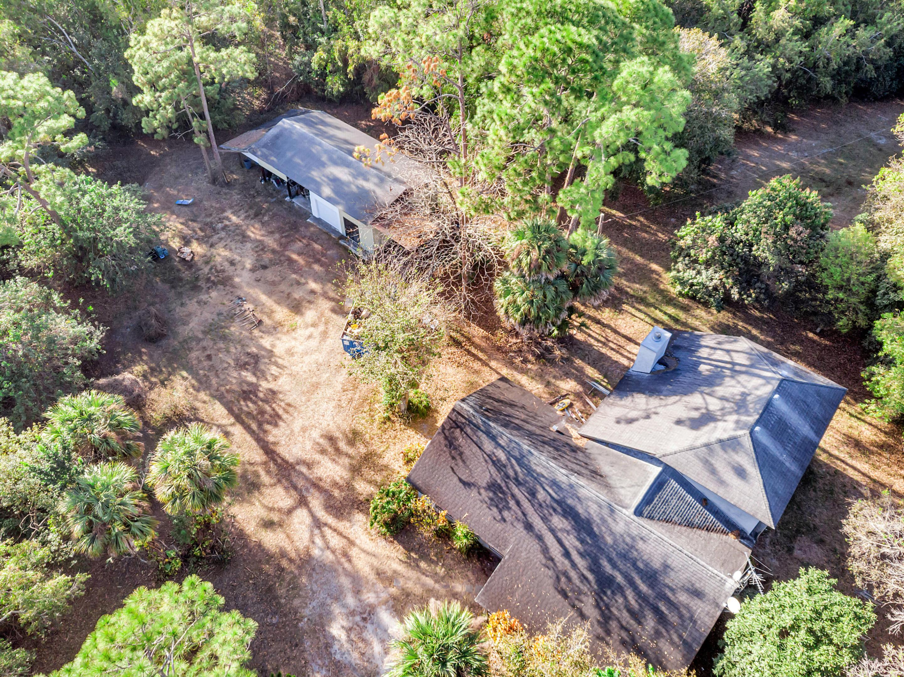 Live Where the World Comes to Ride
Welcome to your own slice of equestrian paradise just minutes from Wellington, the heart of the horse world. Set on five beautiful, usable acres, this property offers the space, privacy, and freedom serious horse owners seek, all near world-class showgrounds, training facilities, and town conveniences.
Design your ideal setup with room for barns, paddocks, arenas, and turnout, or create the farmstead and rural lifestyle you've imagined. A private pond at the back of the property adds charm and provides a peaceful setting for quiet mornings and sunset views. The home offers a rare opportunity to make it entirely your own. An unfinished addition, set to nearly double the square footage once completed, allows you to customize and finish the space to match your vision.
More than acreage, this is your chance to create an exceptional equestrian retreat.