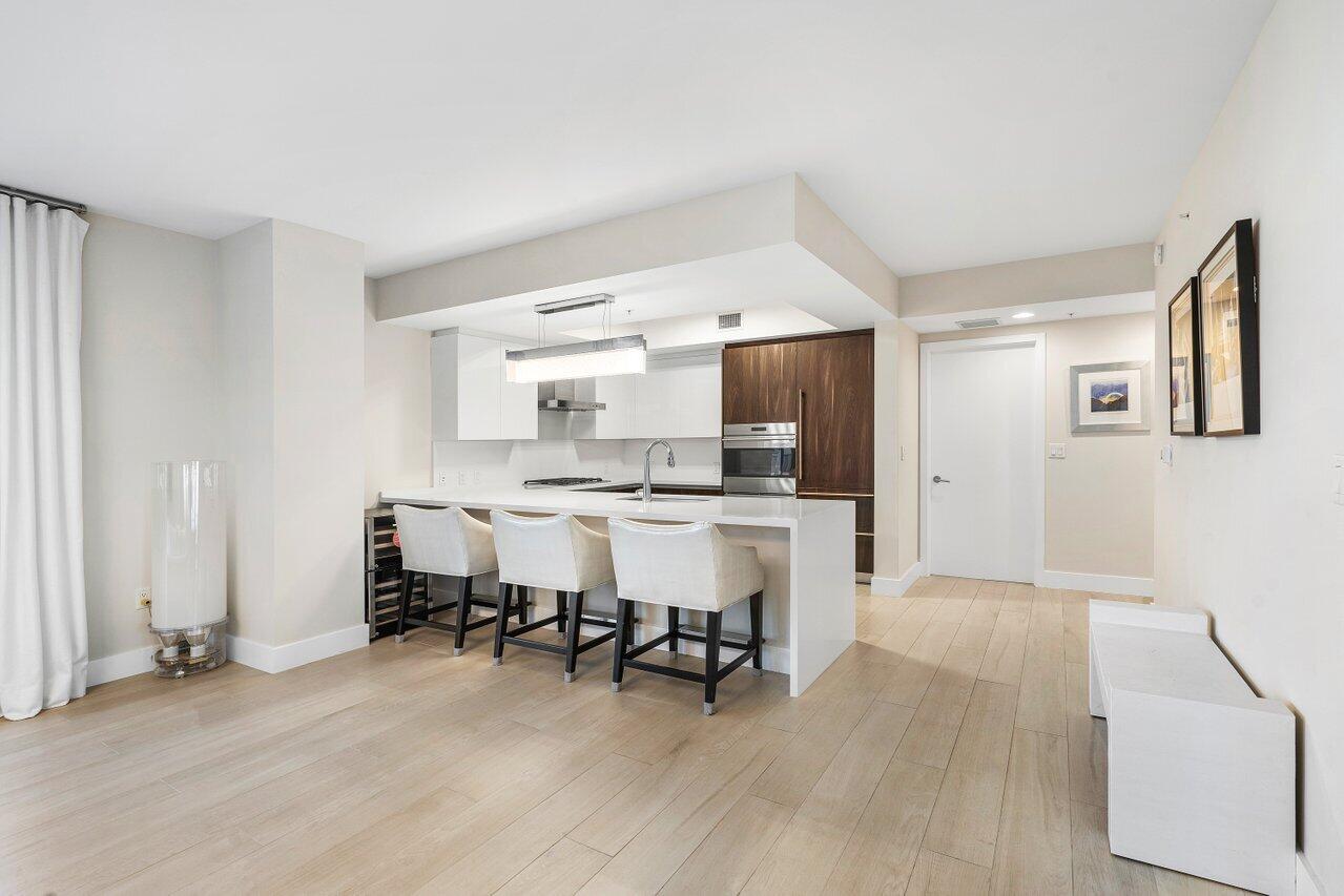 Experience the pinnacle of upscale living in this exquisite residence at Riva.  Offering Italian Kitchen Cabinetry, Sub Zero and Wolf appliances with Gas Cooktop. Located just minutes from the heart of downtown and the  pristine sands of the Atlantic.  This 2 bed/ 2.5 bath offers floor to ceiling windows throughout to flood the unit with natural light.  Resort Caliber amenities throughout the building including state of the art fitness Center with Private Yoga studio, Spa, Billards, Sunset deck, Heated Riverfront pool, 24 hour concierge and full Valet.  Boat Slip available for rent or purchase separately **Ocean Access**