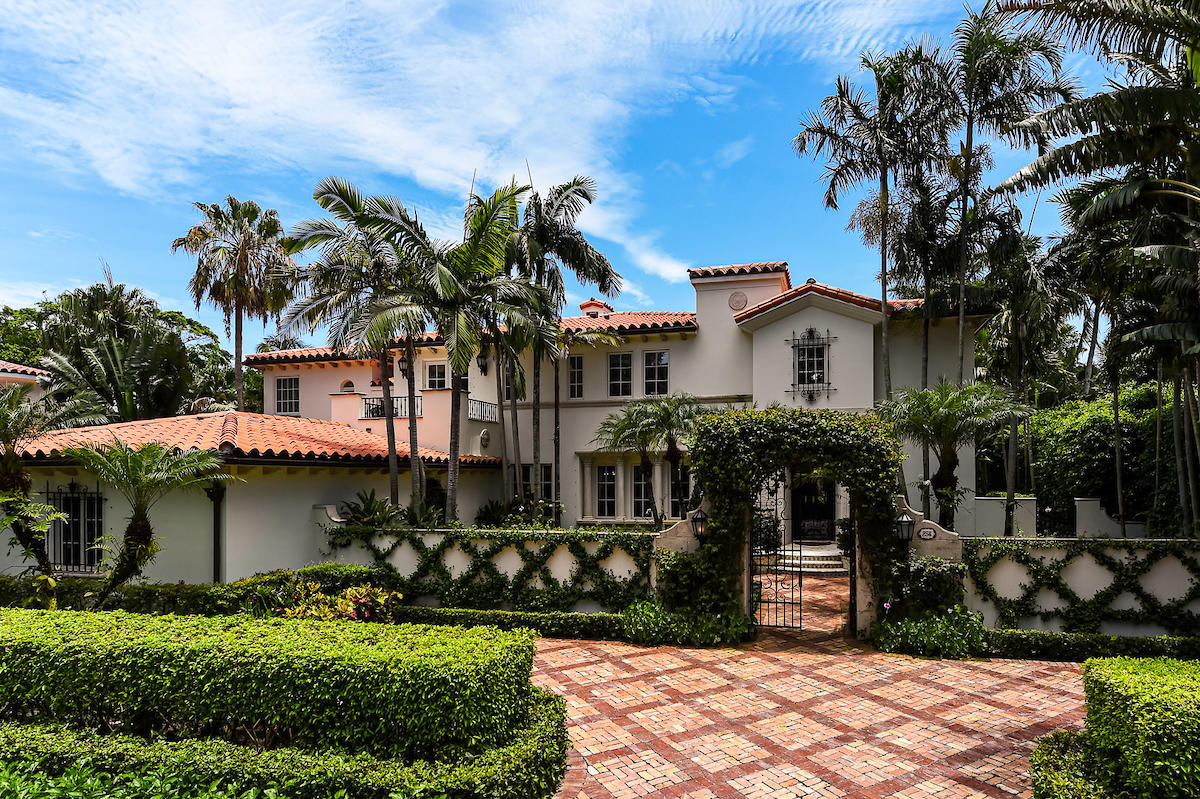 Elegant Mediterranean residence located in the exclusive Phipps Estate. Situated on a lush and tropical lot the house has five bedrooms, six bathrooms and three half baths with total square feet of 9,776+/-. Owner's suite includes two marble baths, two walk-in closets, a sitting area, office and a private terrace. The house has meticulous detail wood beams in the living room and French doors opening to the pool, pecky cypress ceiling in the dining room, pecky cypress library with French doors opening to a covered patio. A gourmet kitchen open to the family room and dining area with French doors out to a large loggia and covered dining loggia. Other features include a summer kitchen heated pool, elevator, fireplaces, fountains and three car garage.