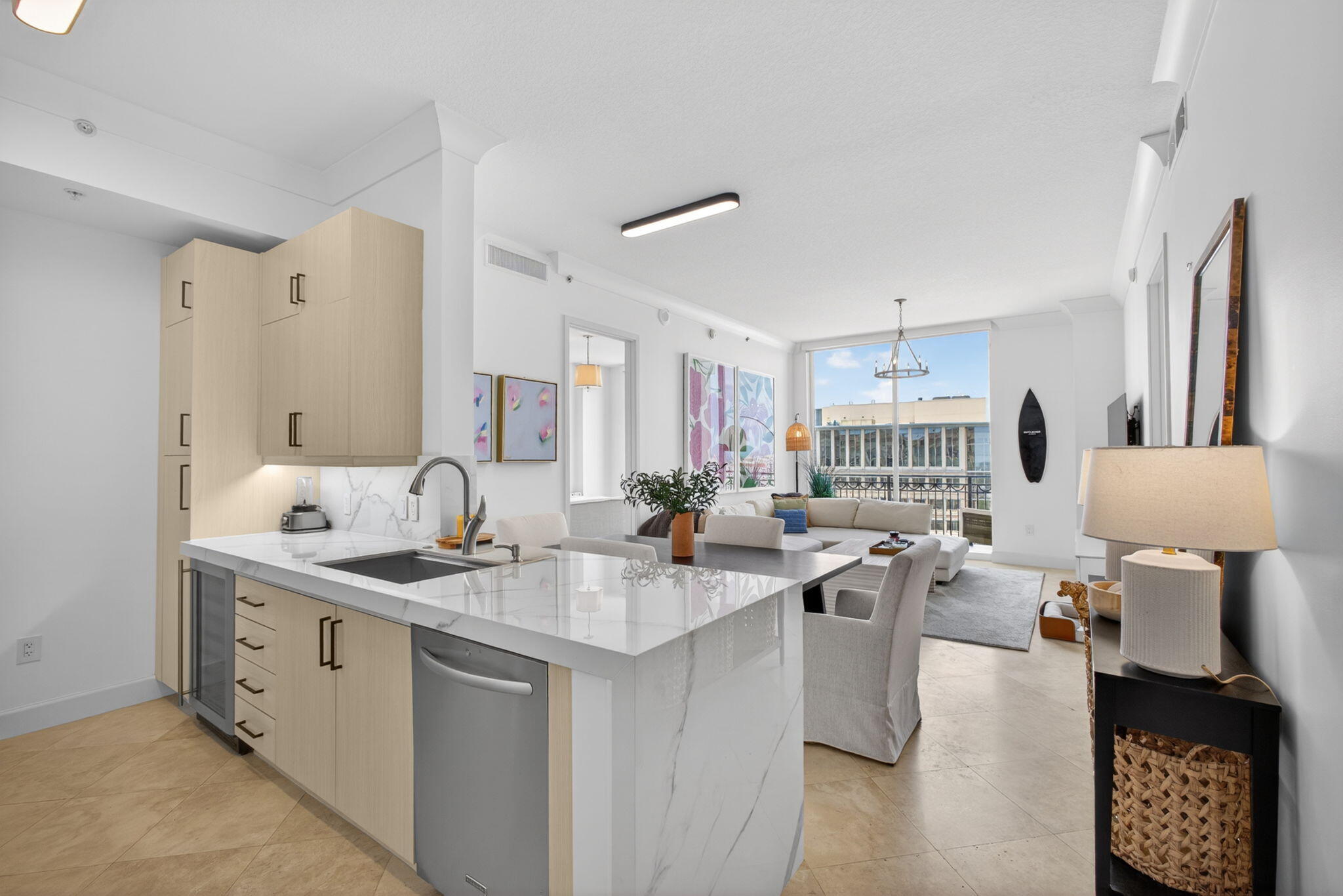 Perched atop the epicenter of downtown West Palm Beach, across the street from Rosemary Square, this upper penthouse 2/2 at CityPlace South Tower offers modern metropolitan luxury lifestyle. Spectacular cityscape & ocean views draw your attention upon entrance, magnified by 10-foot, floor-to-ceiling impact sliders in the living room & primary bedroom & a floor-to-ceiling impact window in the 2nd bedroom. Recent updates include a completely remodeled kitchen with designer cabinetry, a wine refrigerator, brilliant quartz countertops illuminated by track lighting & a 2024 Bosch HVAC system. Brand-new custom solar shades conveniently & dramatically unveil the striking views. This is a truly split floor plan. Each bedroom has a walk-in closet with built-ins. Freshly painted, featuring new Ferguson fixtures, this unit is turnkey. Exclusive to the penthouse levels are the extra-high ceilings, the private lounges by the elevator & the security fob needed for elevator access to the top floor. CityPlace South Tower features a resort-style infinity pool on the 9th floor Upper Pool Deck, which has been recently refreshed with fresh greenery, night lighting, a newly stained pergola & a new heater for the huge hot tub. The Summer Kitchen also has grills available for resident use. The Lobby has been refreshed with new furniture, plant life & modern style. The Club Room is a versatile space displaying new countertops & lighting fixtures, a new media area, a new reading nook (ask about the Book Club) & comfortable furniture. There is a fully equipped fitness center with a massage room & the bathrooms each have large saunas & steam rooms. The building offers 24-hour security & front desk attendant & on-site management. Pull up to the porte-cochere & valet park your car or securely enter the gated garage & self-park. The location is extraordinary. The intersection of OKEECHOBEE BLVD & ROSEMARY AVE sees bustling foot traffic for residents walking to & from CityPlace. Among the locales with great proximity are the Kravis Center for Performing Arts, the Palm Beach Convention Center, Ruth's Chris Steakhouse, The Cheesecake Factory, Restoration Hardware (with rooftop restaurant), Pura Vida & Sloan's Ice Cream. Enjoy live music & yoga classes every weekend on the Lawn at CityPlace. Check out the GreenMarket on Saturday mornings. Also nearby is all of the action on CLEMATIS ST & at Grandview Public Market. Notable annual events include SunFest & the Palm Beach International Boat Show. Hop over the bridge to Palm Beach Island & enjoy the ocean beaches. Residents receive discounted rates at both Canopy & the Hilton, which also regularly hosts yoga classes & other events. Ride the Brightline south to Miami or north to Orlando. Enjoy the convenience of the Tri-Rail as well. Palm Beach International Airport is also very close. Calling this residence home is like being issued the key to downtown West Palm Beach.