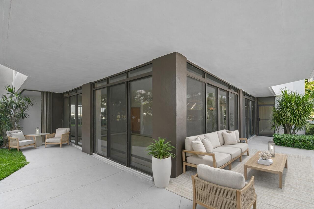 Rarely available first-floor 2BD/2BA waterfront condo offering a true rarity in condo living—your own private wraparound yard. Brand new AC & hot water heater.  Open the sliders and step into total privacy, perfect for morning coffee, sunset views, or letting Fido out with ease. Inside, an open floor plan fills with natural light, featuring spacious bedrooms, spa-like baths, Marina Tower residents enjoy resort-style amenities including a heated pool, spa, social room, covered parking, car wash, 24/7 security, and an on-site marina with Belle's Restaurant. Recent renovations and inspections are complete, making this move-in ready gem the ideal blend of indoor-outdoor living. invitation to savor the serenity of waterfront living. Beyond your doorstep, the scenic two-mile walkway around the marina offers the perfect route for your daily strolls, invigorating jogs, or peaceful evening walks beneath the stars. And for food lovers, indulgence is always within reach an exceptional restaurant is situated right next door, offering fresh flavors and an unbeatable atmosphere. For those craving variety, another local gem awaits just across the street, ensuring world-class dining is always close by. Country Club Living & Premium Amenities For golf enthusiasts and those who appreciate a refined lifestyle, the North Palm Country Club is a short stroll away, providing access to premier golfing, social events, and exclusive amenities. Whether you're perfecting your swing, enjoying a leisurely brunch, or mingling with fellow members, this prestigious club ensures you experience the best of Florida's coastal charm. Inside, the condo boasts a thoughtfully designed open floor plan, maximizing space and natural light. Both bedrooms provide spacious retreats, while the bathrooms are elegantly finished for a spa-like experience. With its unparalleled location, breathtaking views, and luxurious indoor-outdoor flow, this waterfront gem is a rare find that embodies the essence of effortless coastal living.