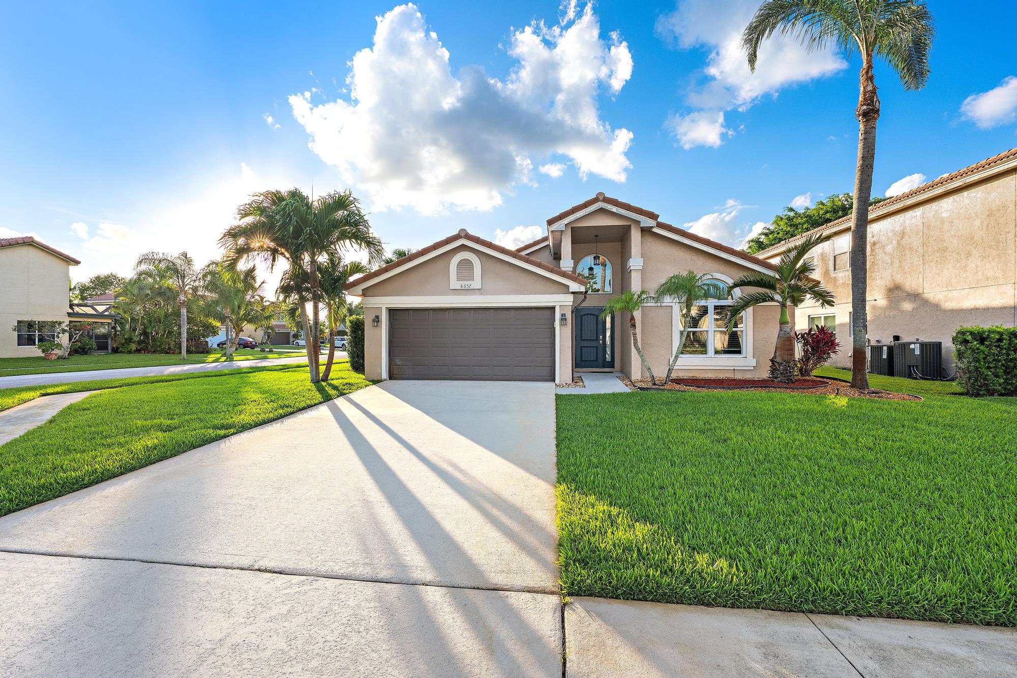 Move right into this impeccably maintained 3-bedroom, 2.5-bath home situated on a desirable corner lot in a family-friendly community with top-rated schools. This beautifully updated residence features Impact Window and doors, Italian porcelain tile throughout the main living areas and newer laminate flooring in all three bedrooms.  The spacious kitchen is equipped with granite countertops and fingerprint-resistant stainless steel appliances, offering both style and functionality. Recent upgrades provide peace of mind, including a impact garage door and opener, electrical panel, thermostat, water heater, attic insulation, window screens, updated light fixtures and blinds, and fresh paint. A clay-style roof was installed in 2017.  Step outside to a fully fenced backyard, professionally  installed with permits, creating the perfect space for children, pets, and outdoor entertaining.  Enjoy an exceptional lifestyle with a low HOA fee of just $206 per month, which includes access to the community pool, two tennis courts, hotwire fiber internet, basic cable with hbo and hbo max. Combining modern upgrades, outstanding amenities, and an excellent location, this move-in-ready home is a rare opportunity you won't want to miss!