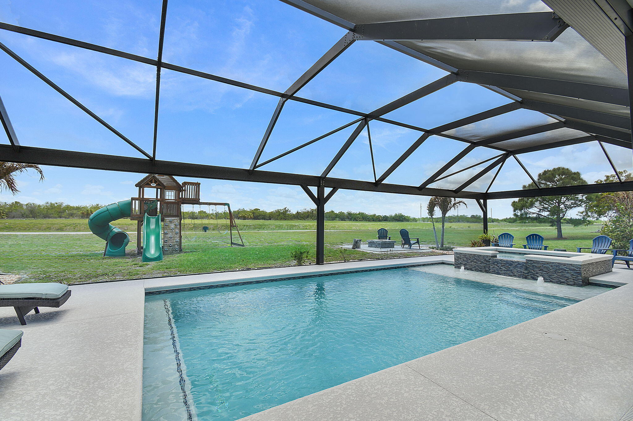 Not your cookie-cutter home. This magazine-worthy 3-bedroom, 2-bath, 2-car garage residence with a den and extra flex space offers the perfect blend of style and versatility. The open-concept family room flows seamlessly to an exceptional backyard retreat featuring a pool, spa, bar, and dedicated dining area—designed for effortless indoor-outdoor living. Why vacation when you can live like you're on one year-round? It's more than a home—it's a lifestyle. No HOA—enjoy the freedom to live by your own rules.  This one must be seen to be appreciated!