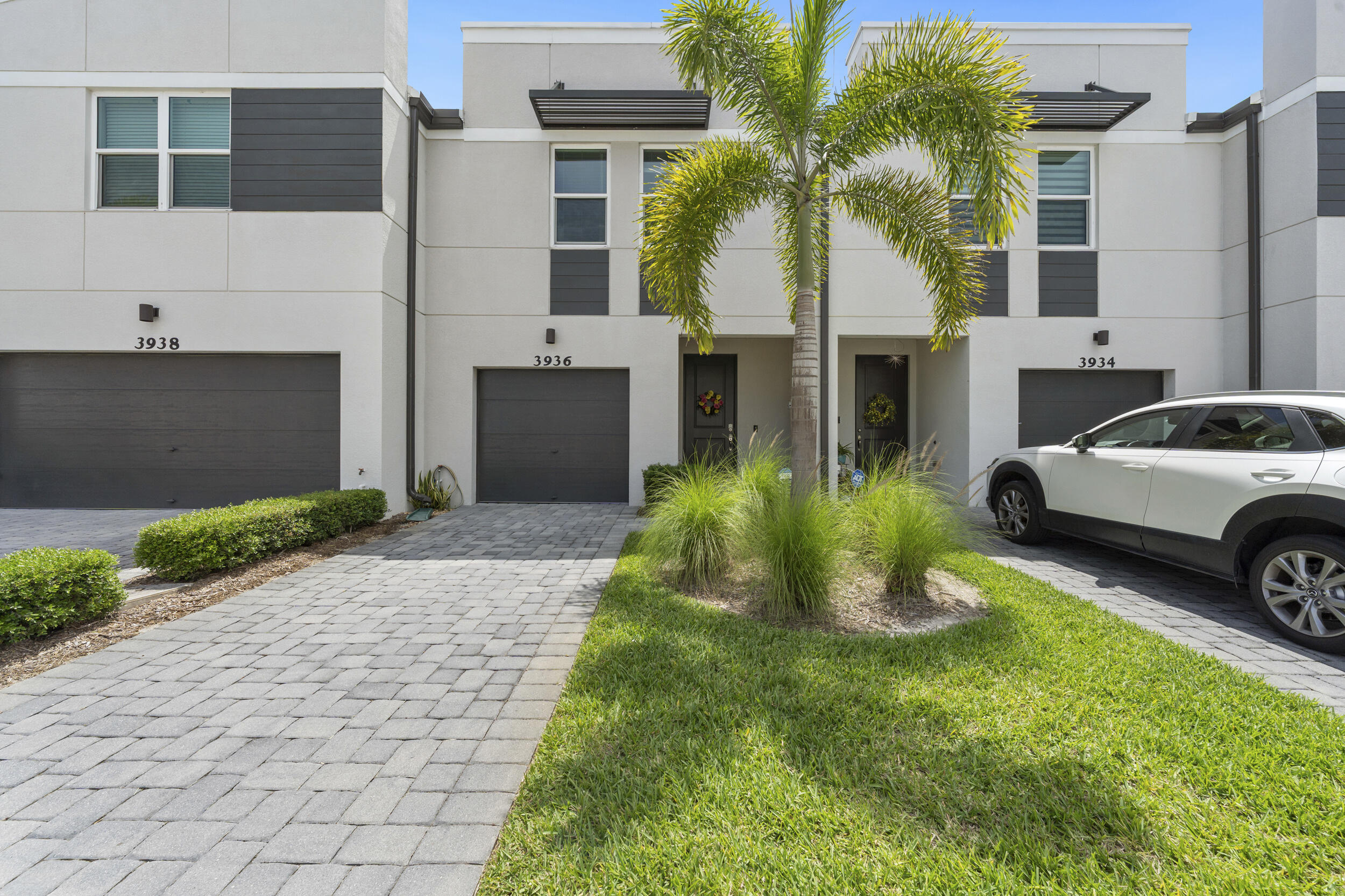 Beautifully furnished and move in ready townhome in the desirable Trillium community offering resort-style amenities including a gated entrance and community pool. This 3-bedroom, 2.5-bath home features approximately 1,485 sq. ft. of living space with a flexible loft area, private patio, and attached one-car garage. The open-concept layout includes stainless steel appliances, a spacious walk-in pantry, custom cabinetry upgrades,  and stylish finishes throughout. The flex loft creates the perfect space for a home office, media room, or additional living area. The home also includes a Samsung washer and dryer and is move-in ready. Conveniently located just minutes from healthcare facilities, the airport, shopping, dining, entertainment, museums, & beaches. Pets allowed and rental-friendly.