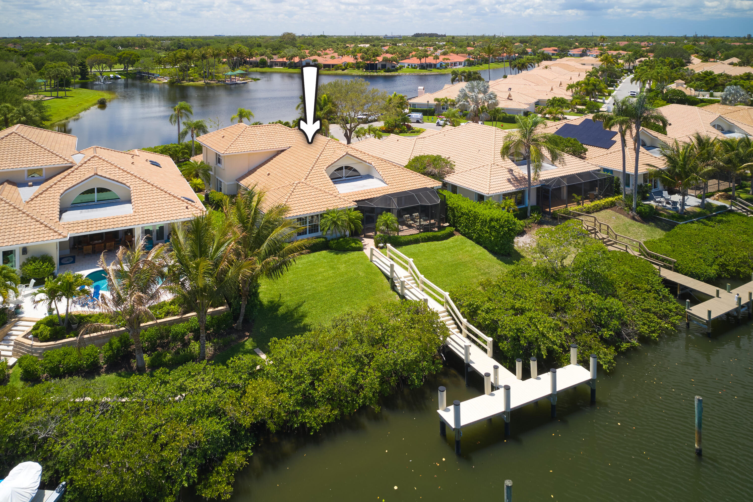 Welcome to 3398 Southern Cay Drive in the sought-after community of Jonathan's Landing in Jupiter. This light-filled residence offers an open and functional floor plan with spacious living areas, high ceilings, and seamless indoor-outdoor flow. A standout feature is the brand new private dock, making this property a true boater's opportunity. Enjoy direct access to the Intracoastal and nearby waterways, perfect for cruising, fishing, or waterfront dining. The outdoor space is ideal for relaxing after a day on the water, with a private patio surrounded by lush tropical landscaping. Inside, the kitchen is well appointed with quart countertops opening to the main living areas for easy entertaining.  The primary suite provides a comfortable retreat with generous closet space and a private bath, additional 3 bedrooms are well-sized for guests, the house is also equipped with an office that can be turned into a 5th bedroom. Located just minutes from Jupiter's beaches, golf, dining, and shopping, Jonathan's Landing is a gated community with optional membership opportunities, including golf, tennis, fitness, and marina amenities. An exceptional blend of comfort and boating lifestyle - move-in ready and not to be missed.