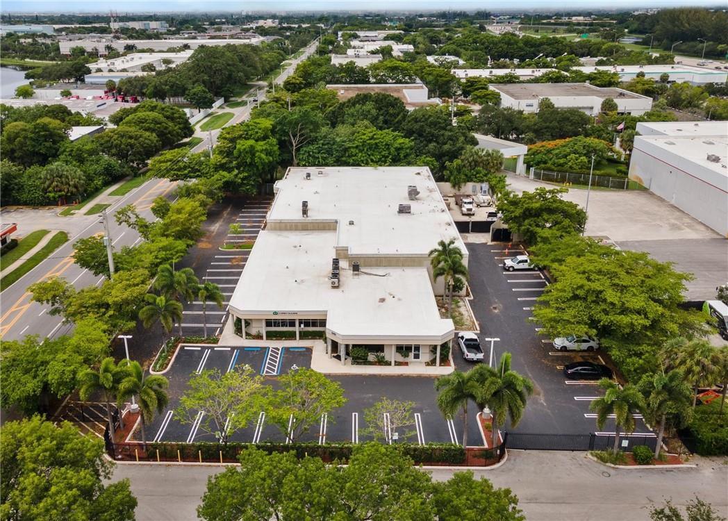 ±20,000 square feet situated on ±1.36 acres. Private offices, multiple conference rooms, executive gym, and top-of-the-line finishes, make this the perfect headquarters for businesses and entrepreneurs looking for a best-in-class asset. Approximately ± 5,300 SF warehouse which includes a ± 1,000 SF enclosed gym. The building can be reconfigured to accommodate additional warehouse space and loading dock. Additional Features: Warehouse height 16’ to joist, 18’ to ceiling, 2 grade level overhead doors, Large open space for classes, seminars, and conferences, Backup generator. Situated in Pompano Beach, this central Broward County location boasts easy access to major expressways servicing Palm Beach, Broward, and Miami-Dade Counties, including the Turnpike, I-95 and Sawgrass