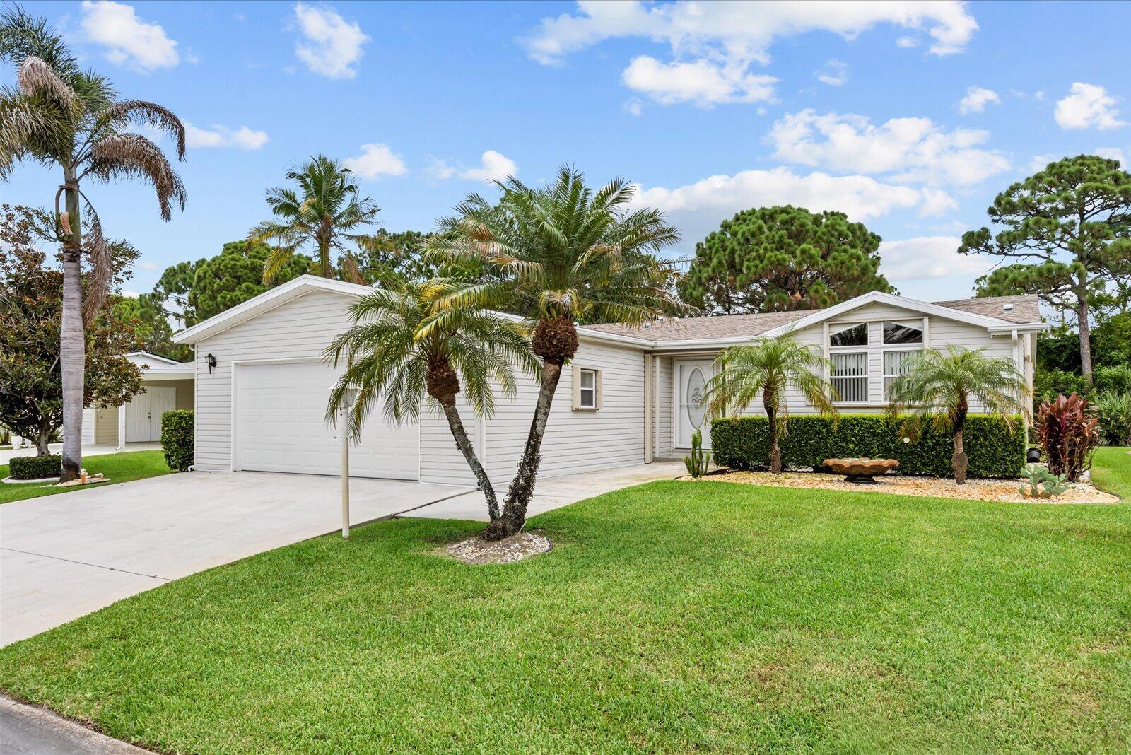 Wake up each morning with a cup of coffee and enjoy peaceful views of the Savannahs State Park Preserve, where wildlife becomes part of your everyday routine. This spacious 1,908 SF home offers 2 oversized bedrooms, 2 baths, plus a versatile den/office or hobby room. Features include a 2021 roof, new 2026 A/C, updated kitchen appliances, laminate flooring, accordion shutters, and a cost-saving irrigation well. A new 2025 Yamaha golf cart is included for cruising the amenity-rich Savanna Club 55+ community featuring golf, pools, fitness centers, pickleball, restaurants, clubs, and endless activities. Privacy, nature, and a fun Florida lifestyle awaits you! Land Lease Property