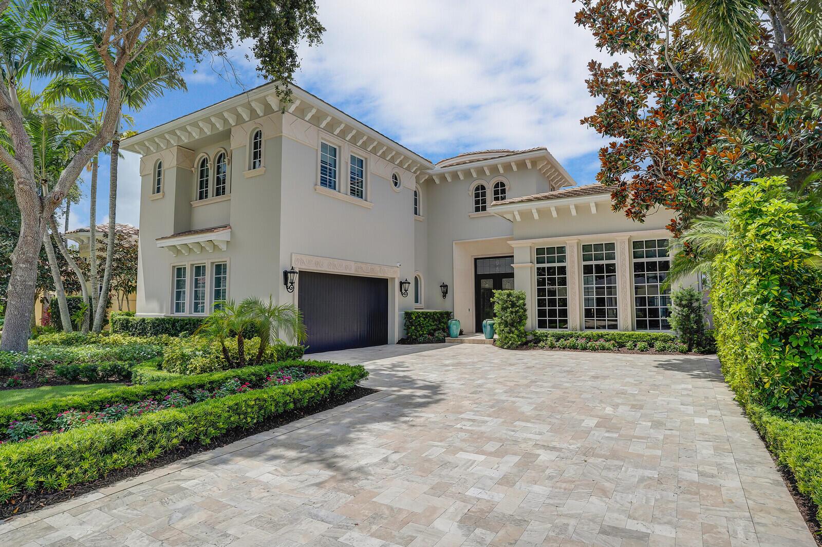 Welcome to timeless sophistication and modern luxury in this fully remodeled Bellucia floor plan, offering 5 bedrooms, 5 full and 3 half baths, plus a spacious loft and 2 CG. Ideally situated on a private lot with tranquil water feature views, this estate is nestled behind the gates of the prestigious Old Palm Golf Club—one of Palm Beach Gardens' most sought-after communities. From the moment you enter, you'll appreciate the volume ceilings, detailed crown molding, and rich marble and wood flooring that elevate the home's refined ambiance. A beautifully designed central courtyard serves as the heart of the home, perfect for seamless indoor-outdoor entertaining. The Downsview custom kitchen is a chef's dream, showcasing Taj Mahal quartzite countertops, premium appliances, and exceptional craftsmanship. The formal living and dining rooms are equally impressive, designed for elegant gatherings and everyday luxury. The first-floor primary suite is a private retreat, offering direct access to the courtyard and pool, two spacious walk-in closets with custom built-ins, and a spa-like bath complete with soaking tub and a luxurious walk-in shower. A fifth bedroom on the main level also features a full bath and walk-in closet, making it ideal as a private guest suite or home office. Upstairs, three generously sized guest suites each enjoy their own private bathrooms, along with an expansive loft and an additional powder room, creating a comfortable and private space for guests or family. Step outside to your own private resort complete with a sun-shelf pool, spa, summer kitchen, lush landscaping, and peaceful water views. Additional features include a 2022 roof, hurricane-impact windows and doors, air-conditioned 2-car garage with custom built-ins, and advanced Halo air and water purification systems. All bathrooms have been thoughtfully updated to reflect today's luxury standards. Offered fully furnished (excluding all artwork, all lamps, personal items, accessories, and select sentimental furniture pieces), this move-in-ready masterpiece invites you to begin enjoying the world-class lifestyle of Old Palm Golf Club. Residents enjoy access to a Raymond Floyd-designed championship golf course, fine dining, spa, fitness center, and an exclusive beach club. Golf membership is required. This exceptional home is a rare offering schedule your private showing today.