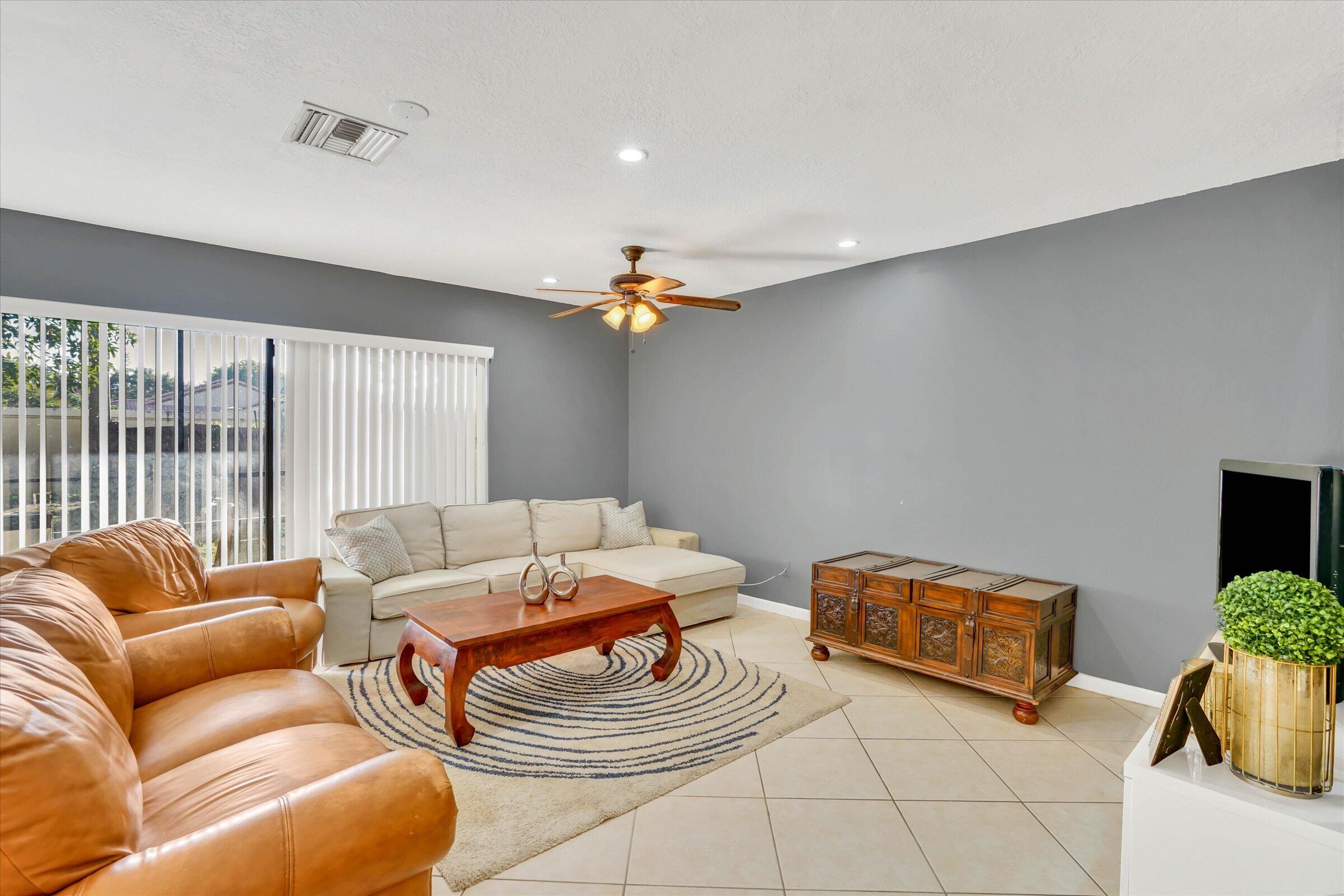 Beautiful and spacious 2BR/2.5BA townhome featuring tile flooring throughout the first floor and wood flooring on the second level. Both bedrooms are primary suites, offering privacy and comfort, with one featuring a large walk-in closet. Enjoy the screened porch overlooking a spacious backyard, perfect for relaxing or entertaining. The home includes two assigned parking spaces plus ample guest parking. Community amenities include a swimming pool and children's playground. Conveniently located near shopping, restaurants, and major highways, offering easy access to everything you need. Don't miss this fantastic opportunity! NO RENTAL RESTRICTIONS & LOW HOA $185/MONTH!