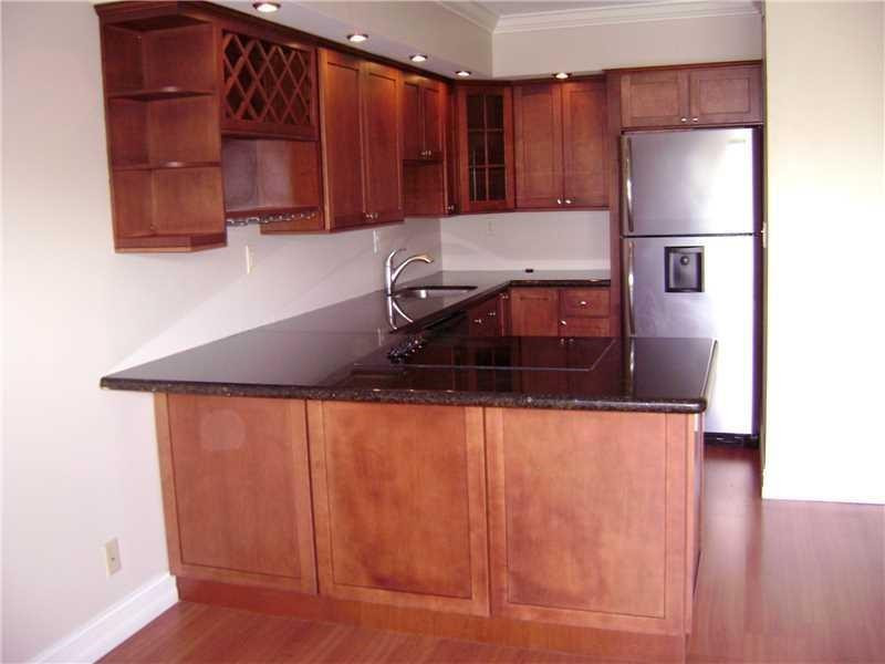 PRICED TO SELL !!! BRING OFFERS.!!!UNIT NEXT DOOR SOLD FOR $219,000 A YEAR AGO!!! CAN RENT IMMEDIATELY FOR $1700-$1800 MONTHLY!!!PEACEFUL VIEWS OF THE MIDDLE RIVER FROM THIS FIRST FLOOR UNIT. SMALL PATIO WITH WATERVIEWS,  NEWER KITCHEN WITH GRANITE COUNTERTOPS ALL OPEN TO LIVING/DINING AREA. NICE BATH WITH SLATE TILED SHOWER. LAUNDRY AND PARKING JUST OUTSIDE FRONT DOOR. LAMINATE FLOORS IN LIVING AREA, CARPET IN BEDROOM.  CURRENT TENANT  WILL VACATE ON OCTOBER 31ST.