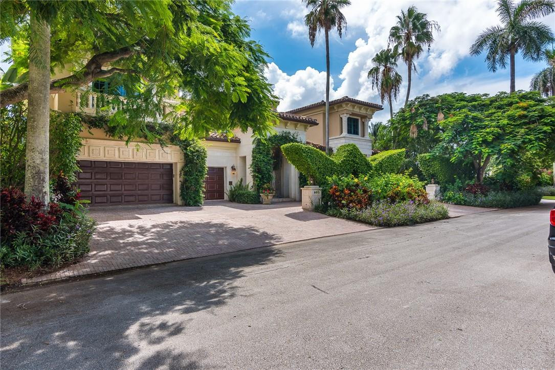 This magnificent property sits on a rare & coveted DOUBLE LOT only 2 houses from the point with Spanish-tiled gazebo overlooking a large garden & brick paver parking on the 2nd COMPLETELY BUILDABLE FULL LOT. Casa Luna, a Grand Mizner-style estate on 220’ of waterfront. Beautiful iron gate & courtyard lead to this showcase home offering a discerning style of living & entertaining. Exquisite marble foyer to stunning 2-story living room with floor-to-ceiling windows, columned archways & coquina stone fireplace. Classically appointed library with pecky cypress ceiling & fireplace. Family room with full-size wet bar, wine cellar & doors to lanai with summer kitchen & fireplace. Downstairs suite with kitchen. Large upstairs master wing. Spiral staircase to 3rd floor deck with breathtaking views.