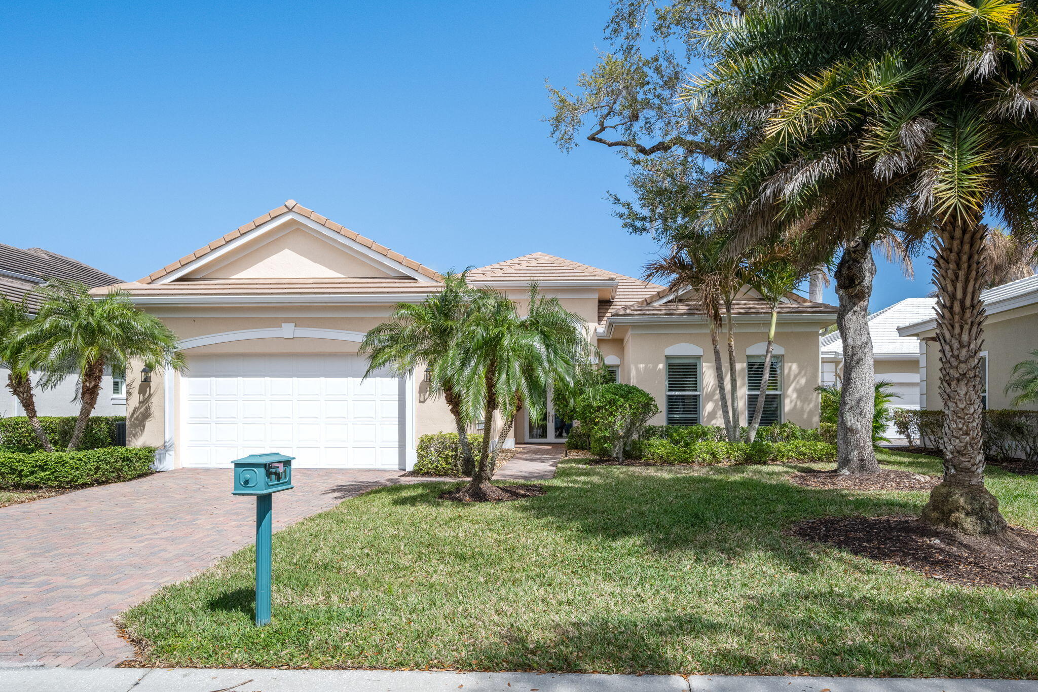 Live 5-7 min from beaches, shopping, Cleveland Clinic and more! This 3BR+Den/3.5BA, 2015 GHO home features an open floor plan with volume ceilings. Large gourmet island kitchen boasts an induction cooktop, wine cooler, pantry and more. Primary suite with 12 ft tray ceiling, double Calif Closets, and a spacious bathroom w/ soaking tub and walk in shower. Each bedroom features its own en-suite bathroom and custom closets. Tropical covered screened lanai with saltwater pool. Impact windows with custom window treatments. Community offers tennis, heated pool, fitness room, and gathering space.