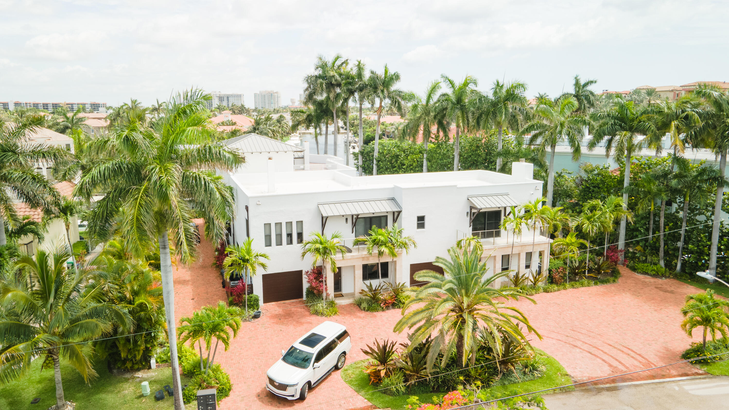 Discover this distinctive waterfront quadruplex in the Bel Lido community of Highland Beach, offering 8,041 square feet of finished space across three floors. This multi-unit property presents a compelling investment opportunity with multiple income-generating potential. The waterfront location provides exceptional property value and unique appeal. Thoughtfully designed across three levels, this residence combines spacious accommodations with waterfront convenience. Whether seeking a primary residence, investment portfolio addition, or multi-generational living arrangement, this Highland Beach property delivers substantial square footage and waterfront positioning.